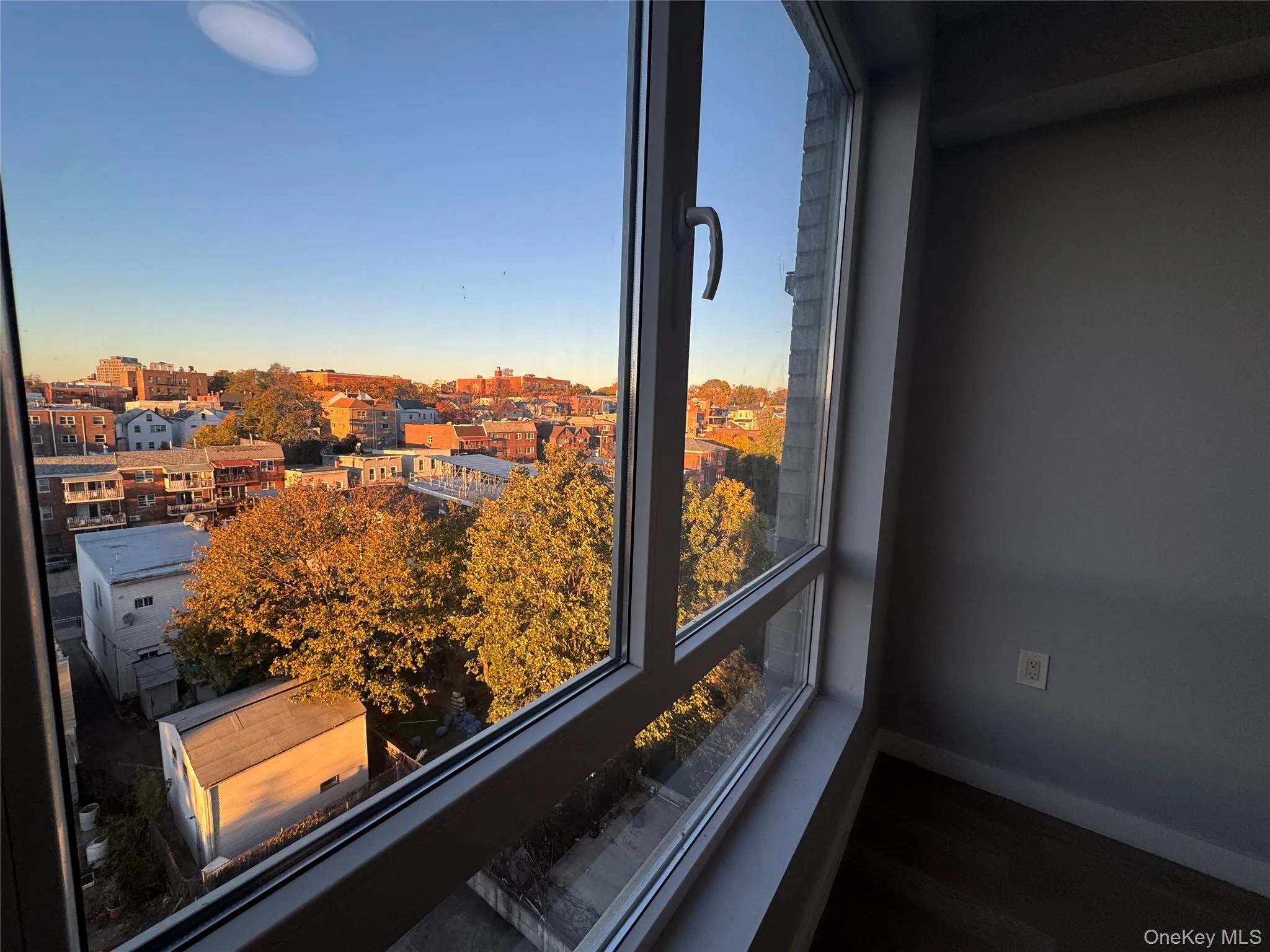 Detailed view of baseboards and a view of city Detailed view of baseboards and a view of city