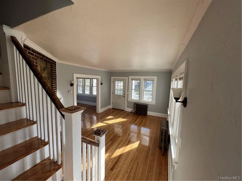 Living room with stairs to the second floor Living room with stairs to the second floor