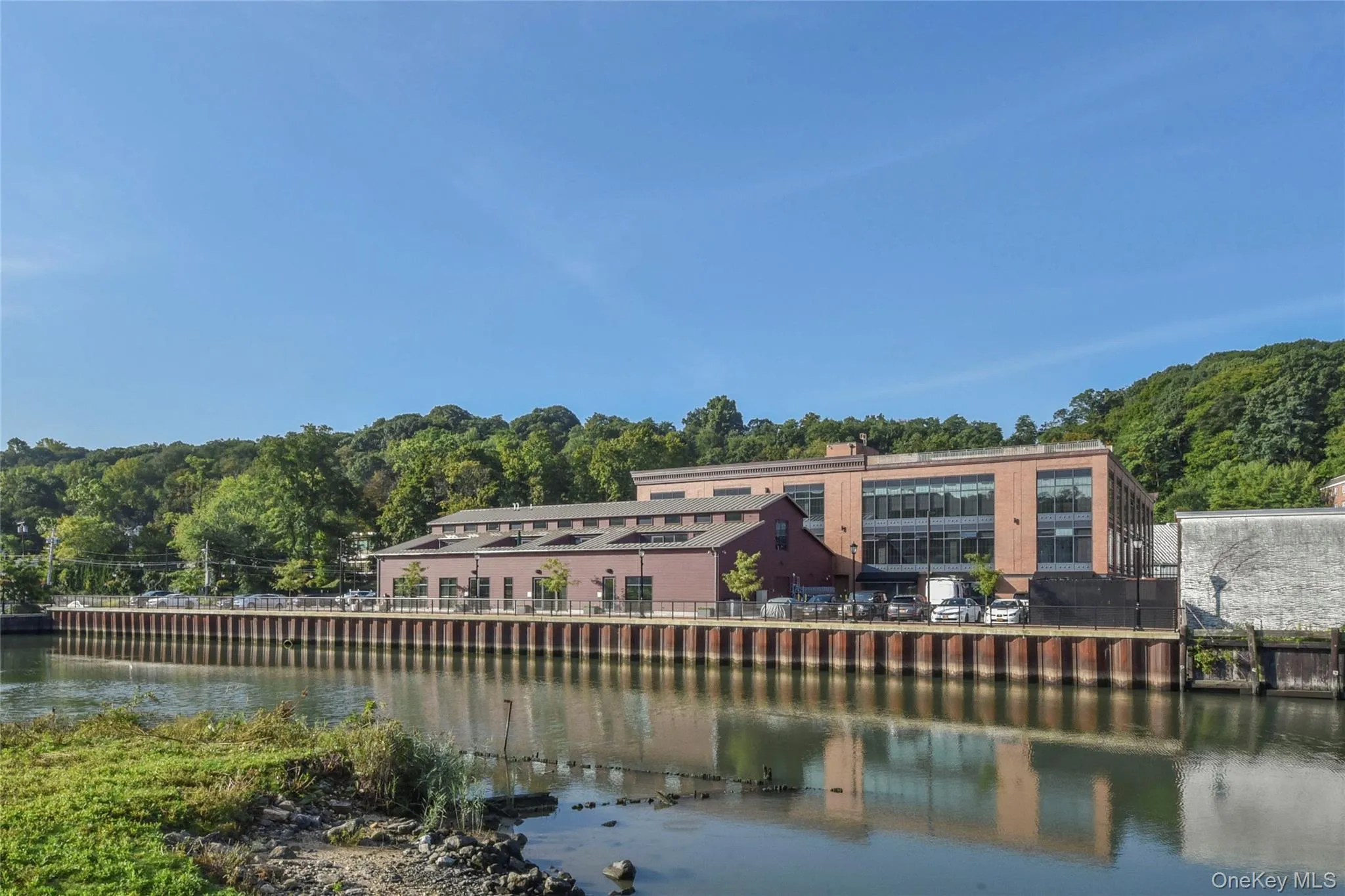 Back of house with a water view Back of house with a water view