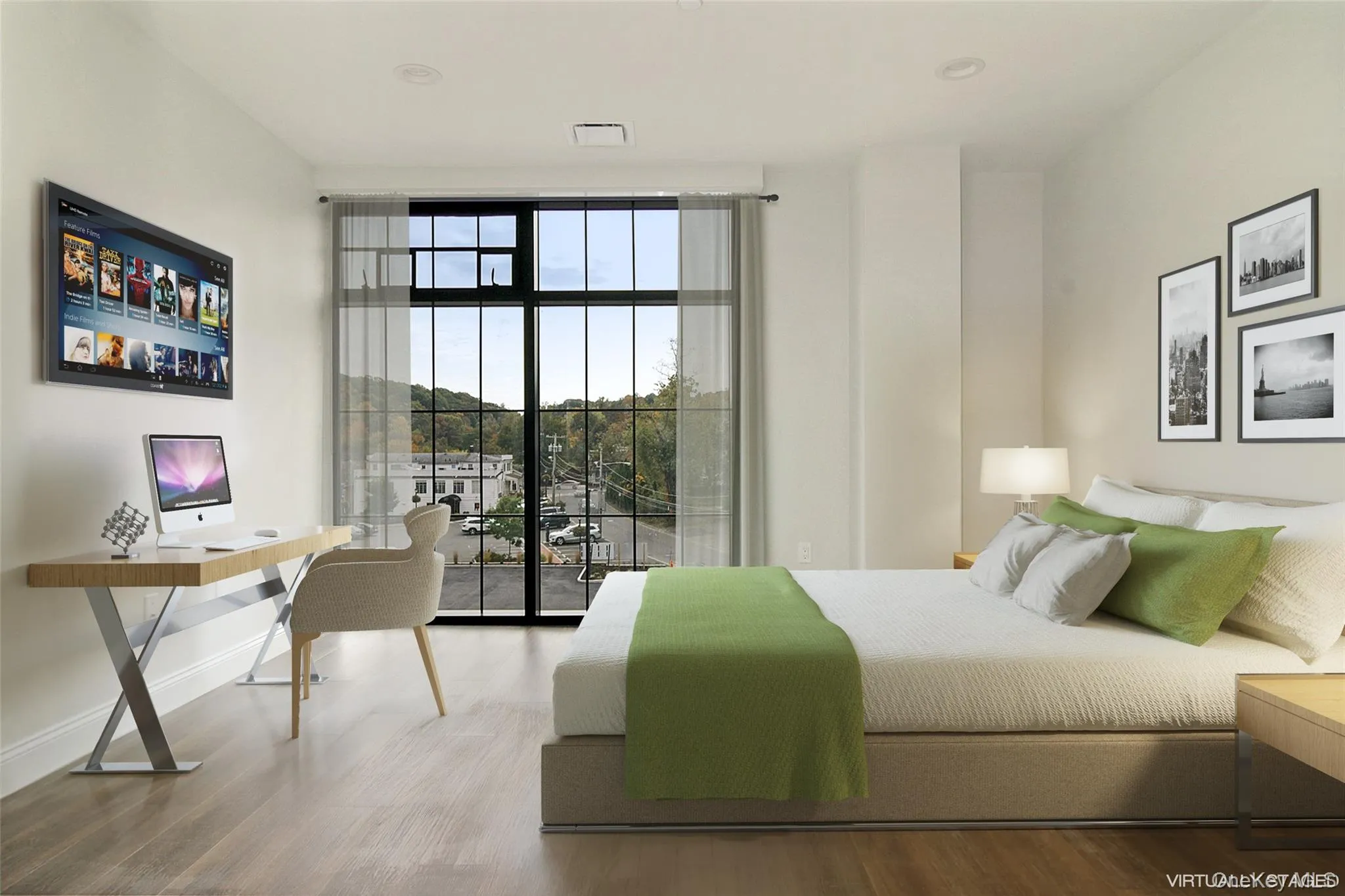 Bedroom featuring a wall of windows, access to exterior, wood finished floors, and an office area Bedroom featuring a wall of windows, access to exterior, wood finished floors, and an office area