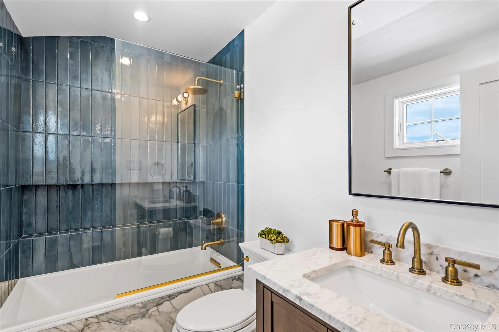 Full bath featuring vanity and shower / tub combination Full bath featuring vanity and shower / tub combination