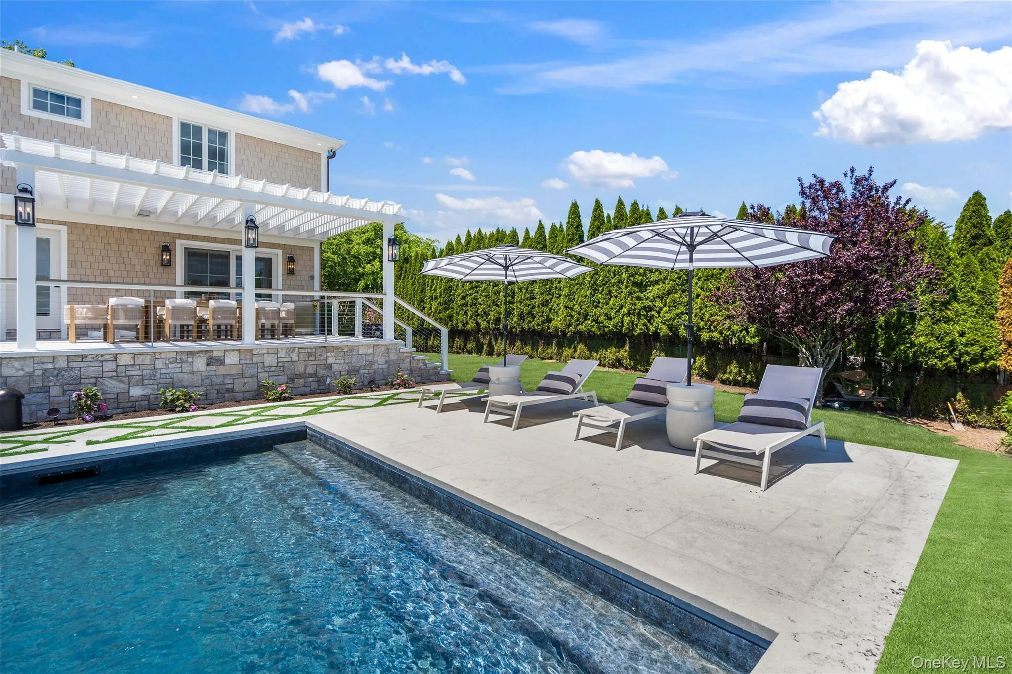 Swimming pool with a patio area Swimming pool with a patio area