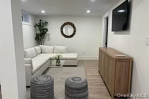 Living room featuring recessed lighting and baseboards Living room featuring recessed lighting and baseboards