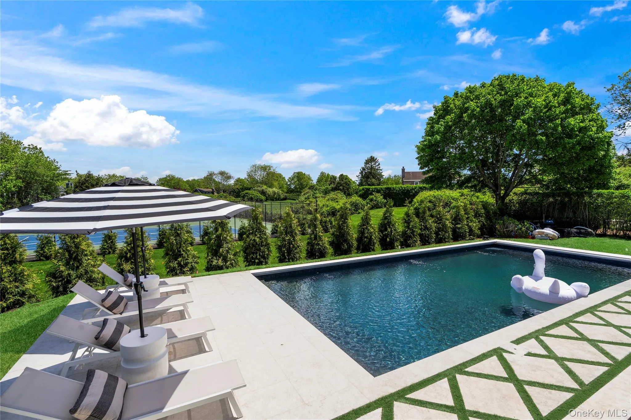 View of pool with a patio View of pool with a patio