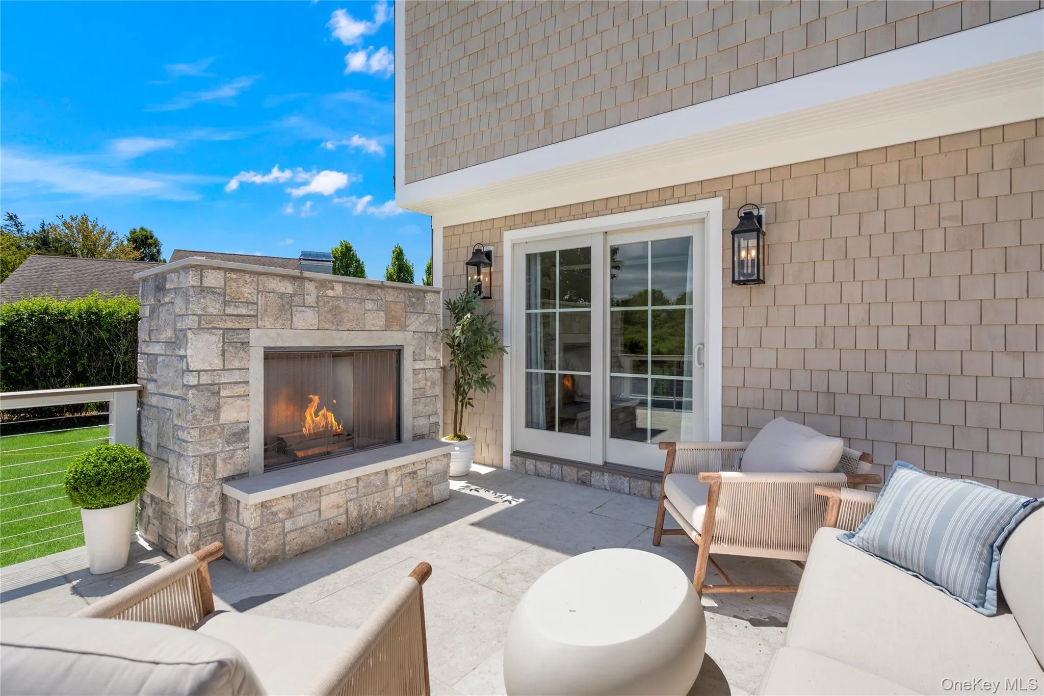 View of patio featuring an outdoor living space with a fireplace View of patio featuring an outdoor living space with a fireplace