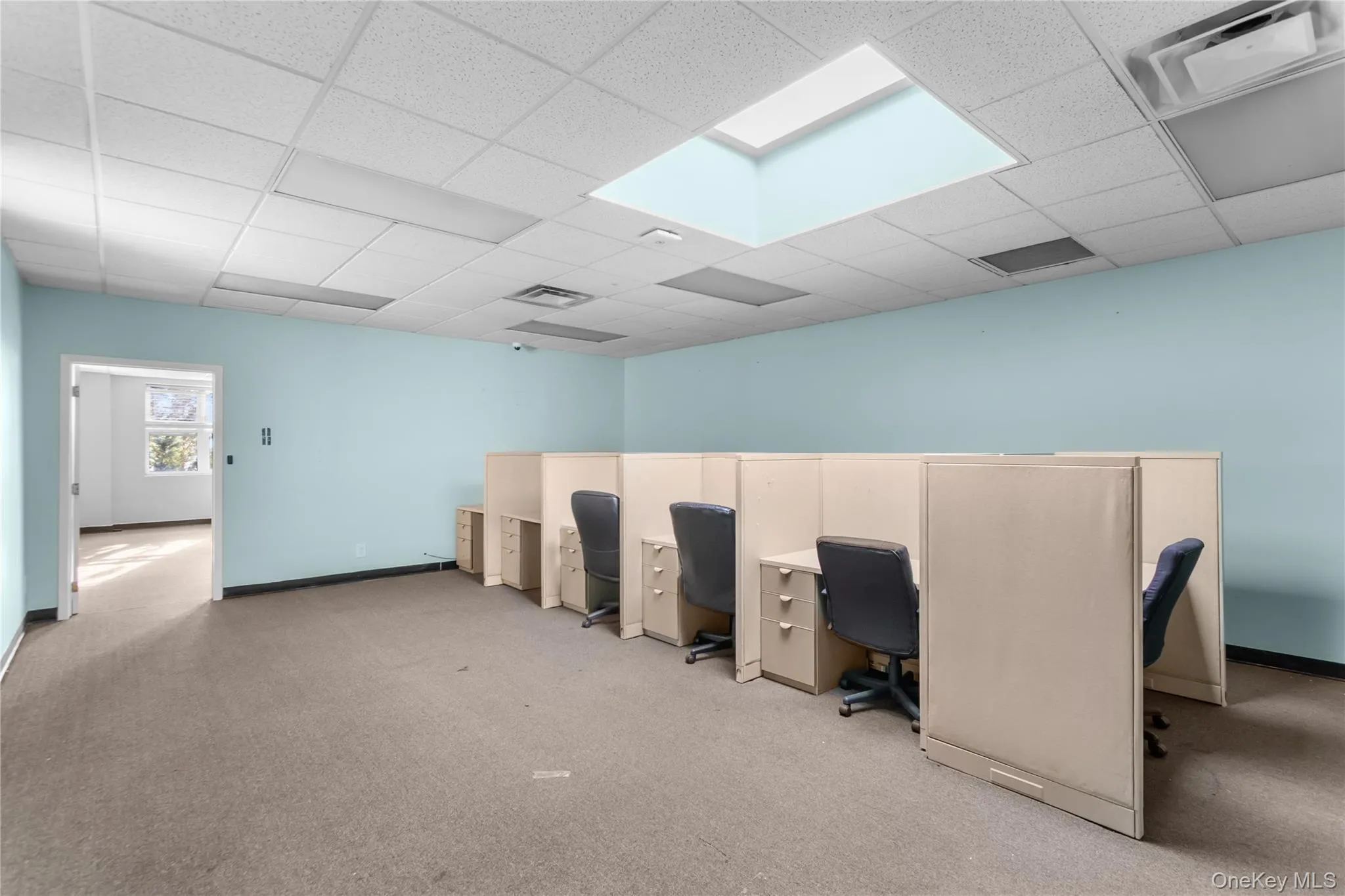 Home office featuring a drop ceiling Home office featuring a drop ceiling