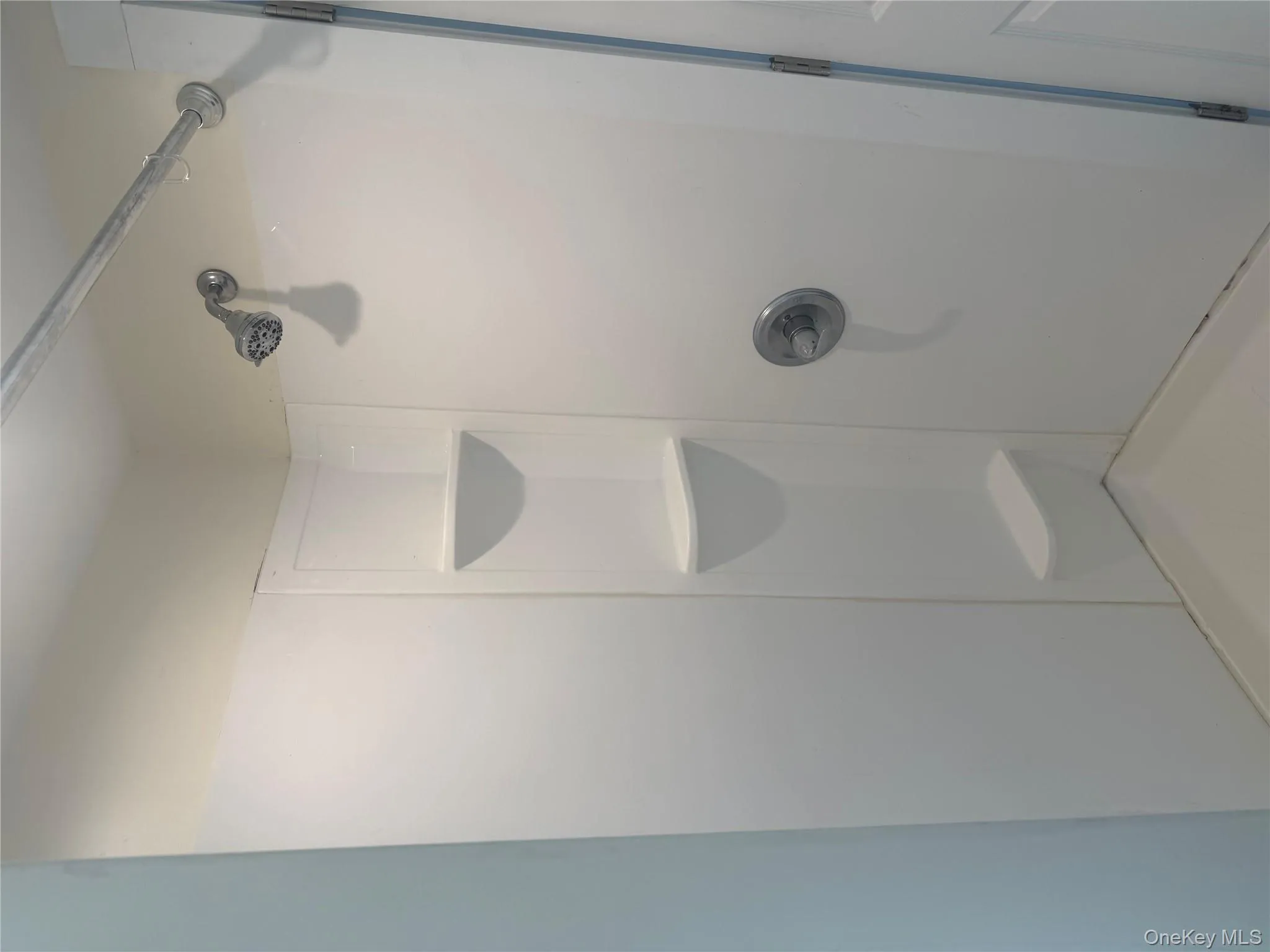 Full bathroom with a stall shower Full bathroom with a stall shower