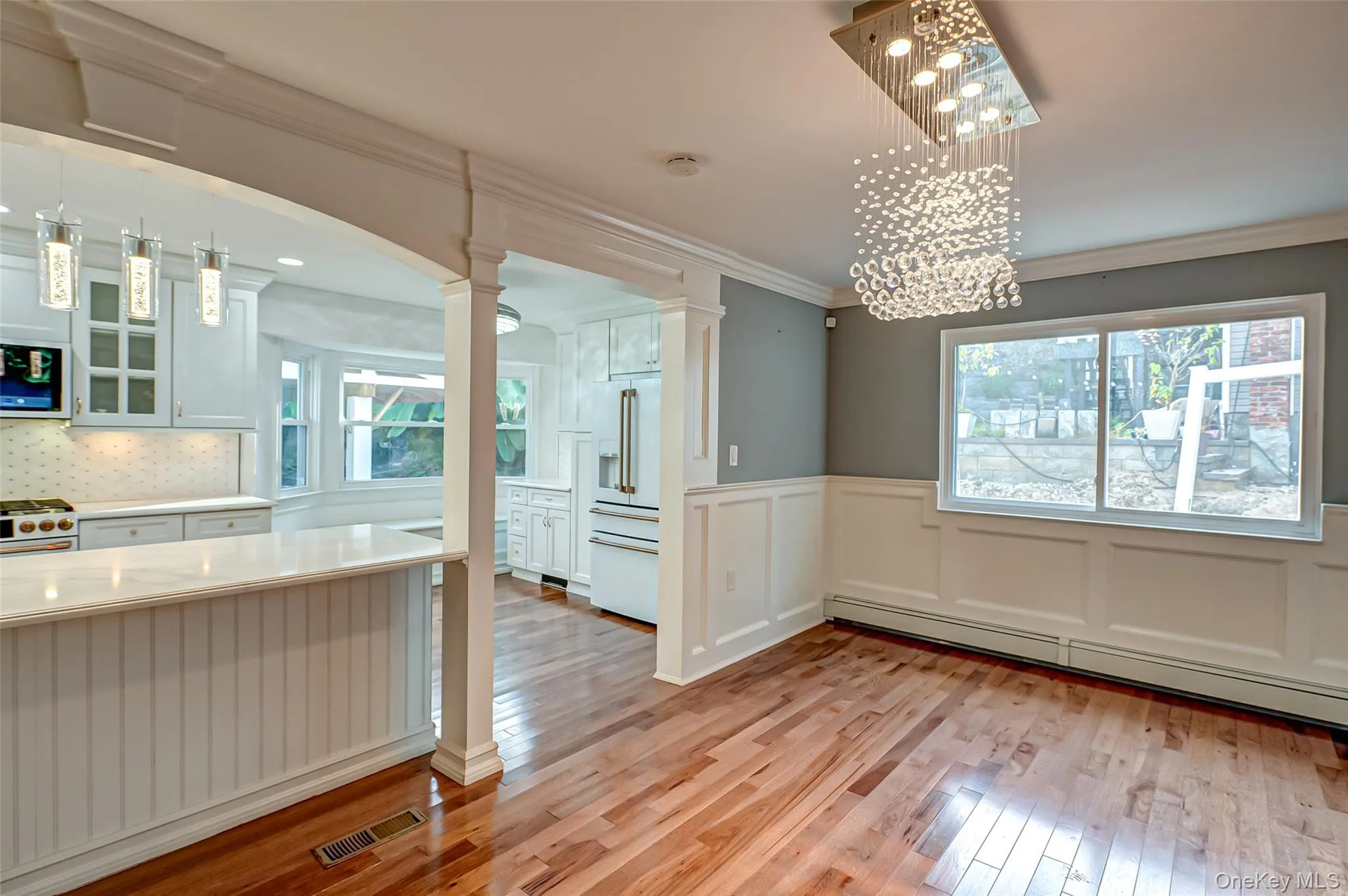 Kitchen featuring white cabinets, GE cafe appliances. Kitchen featuring white cabinets, GE cafe appliances.
