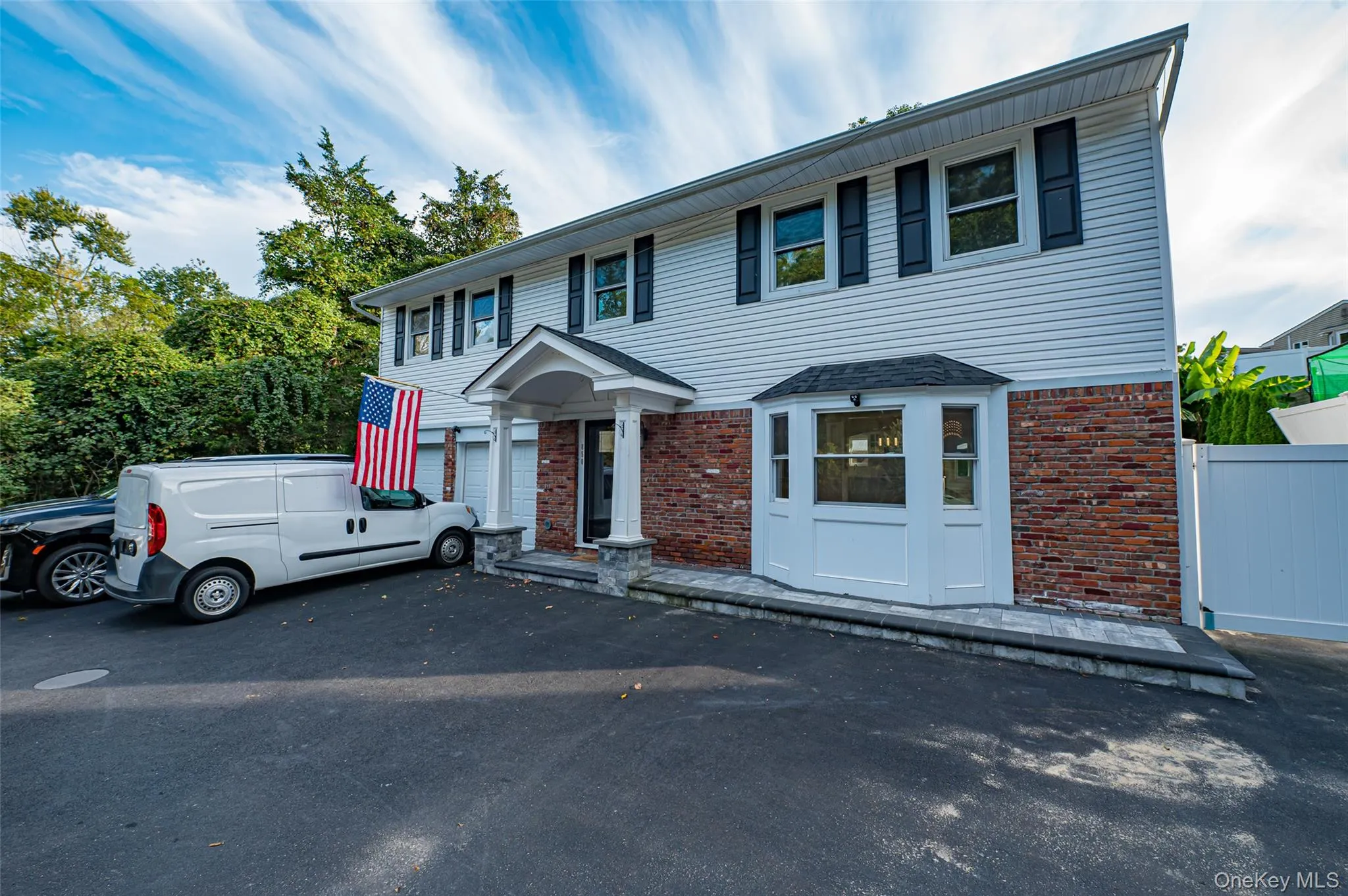 View of front of property with brick and vinyl siding View of front of property with brick and vinyl siding