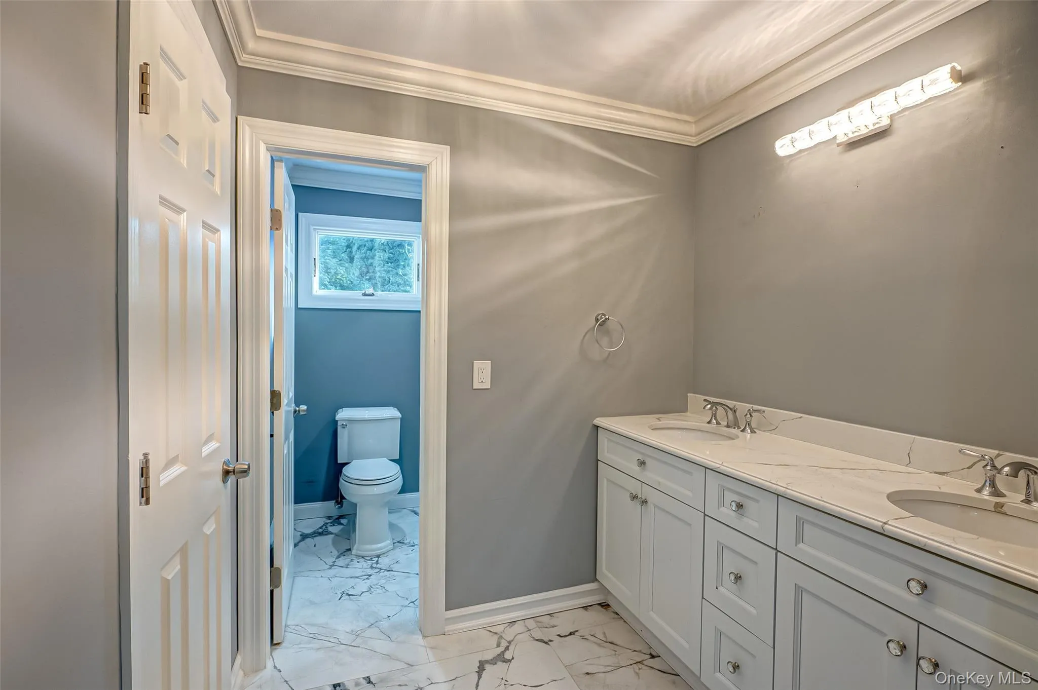 Primary Ensuite Bathroom with double vanity, separate walk in shower and toilet with door. Primary Ensuite Bathroom with double vanity, separate walk in shower and toilet with door.