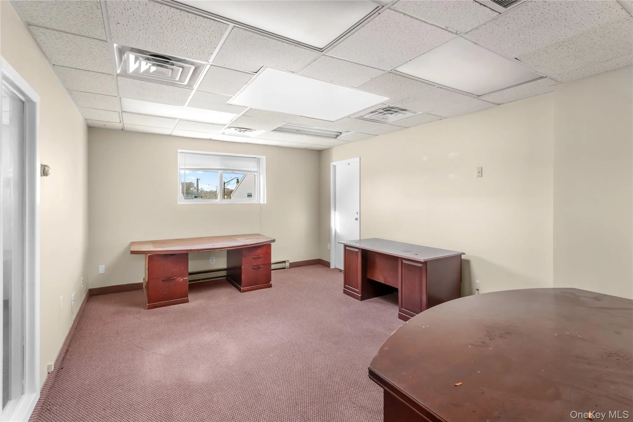 Home office featuring a paneled ceiling Home office featuring a paneled ceiling