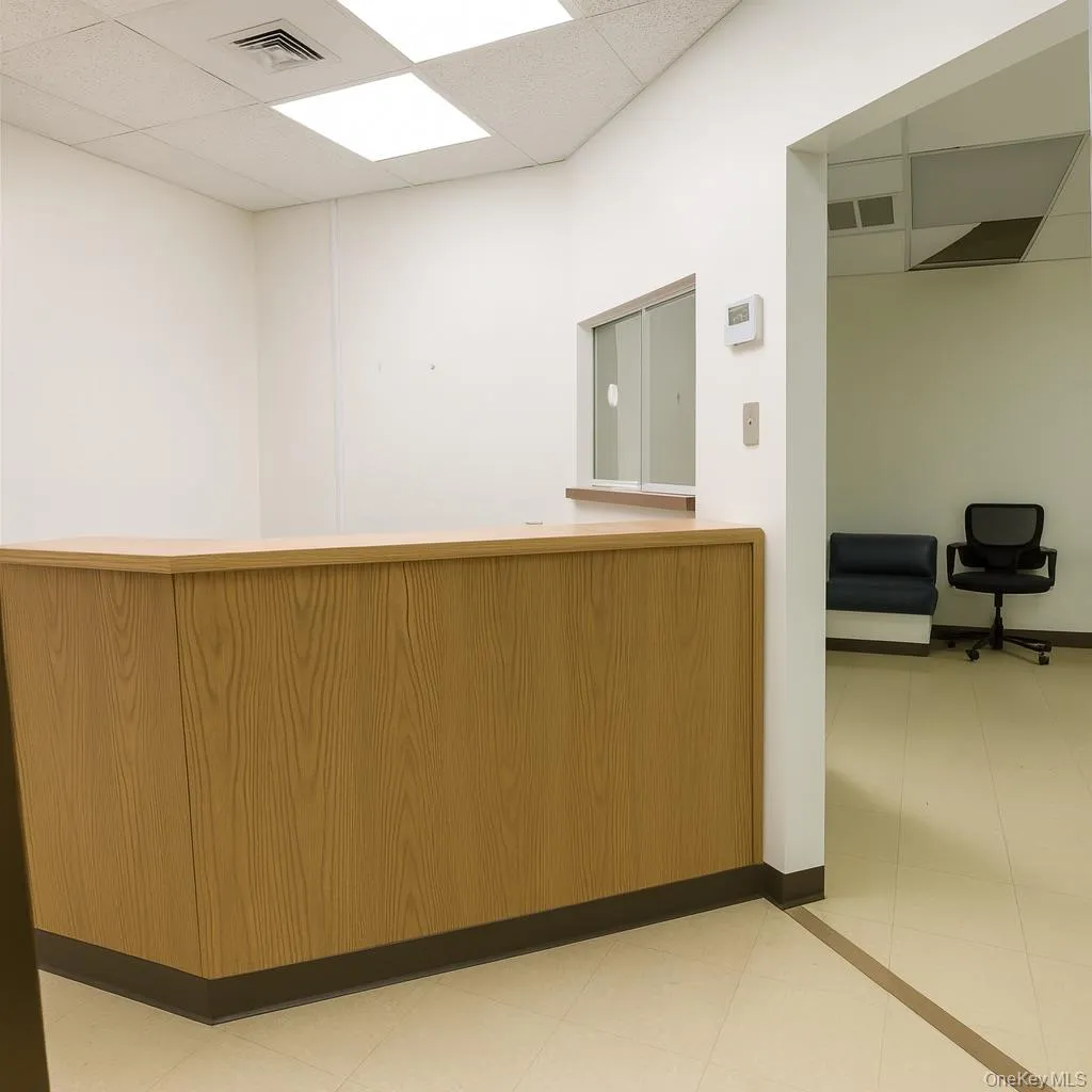 Welcome area featuring a paneled ceiling Welcome area featuring a paneled ceiling
