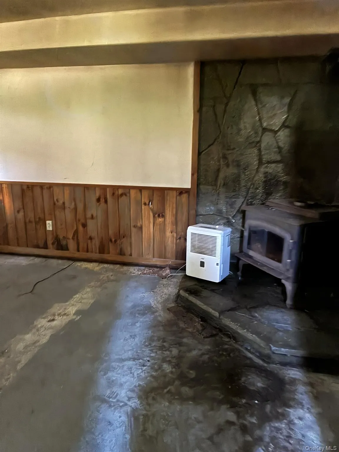 Den or Game room with woodstove Den or Game room with woodstove
