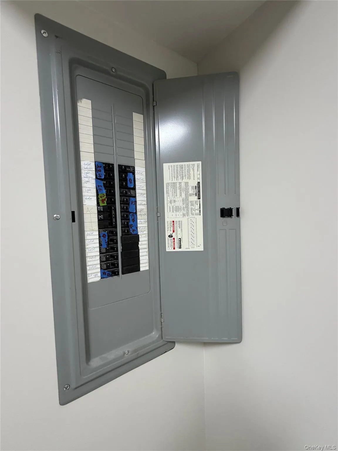 Utility room with electric panel Utility room with electric panel