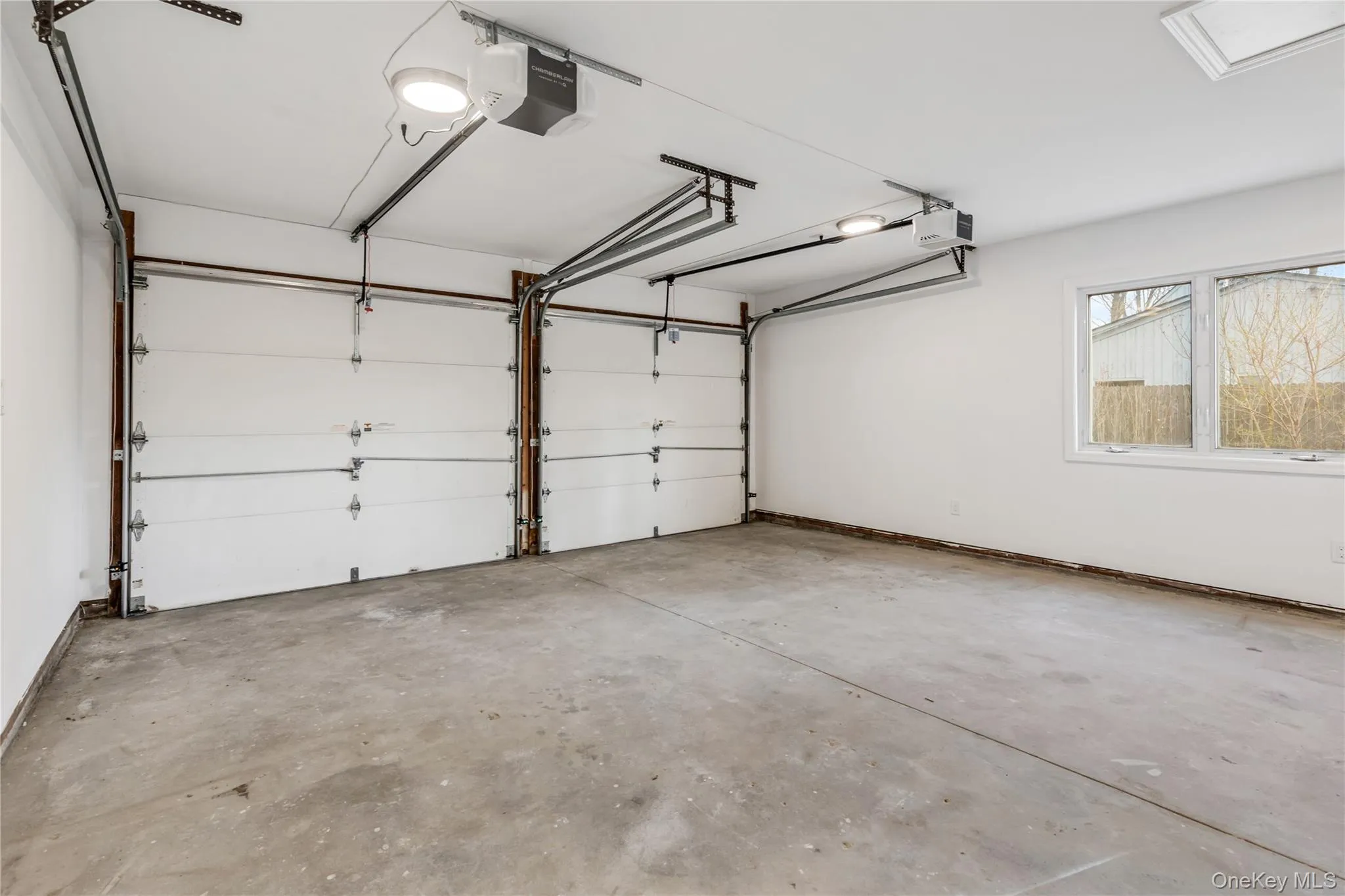 Garage with a garage door opener Garage with a garage door opener