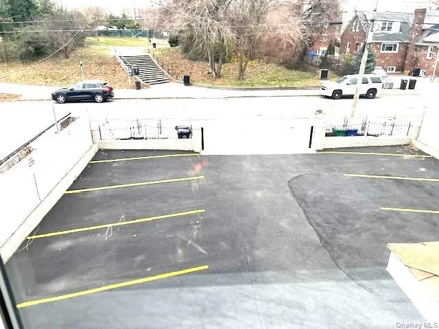 View of uncovered parking lot View of uncovered parking lot