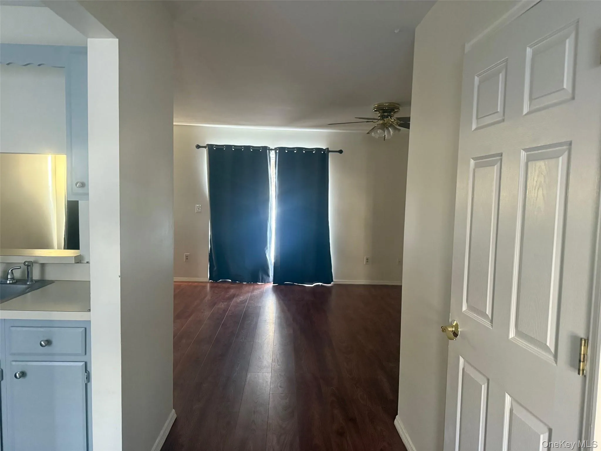 Living room straight ahead with sliding glass doors. Living room straight ahead with sliding glass doors.