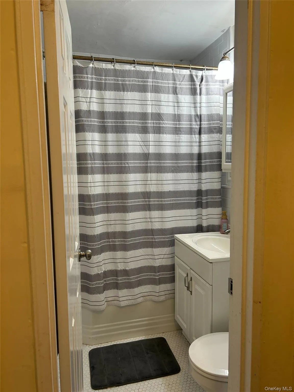 Full bathroom featuring vanity and toilet Full bathroom featuring vanity and toilet