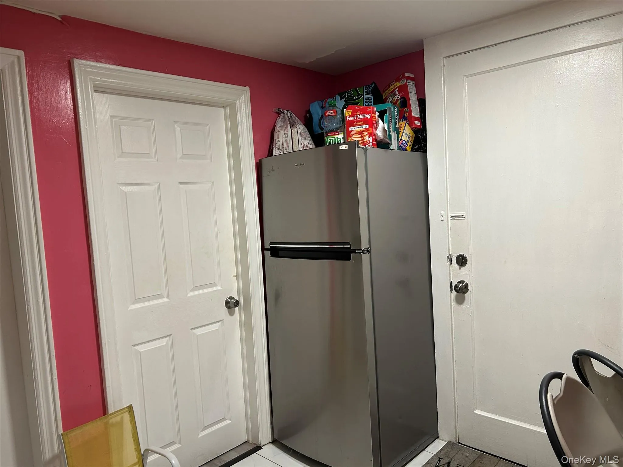 Kitchen with freestanding refrigerator Kitchen with freestanding refrigerator