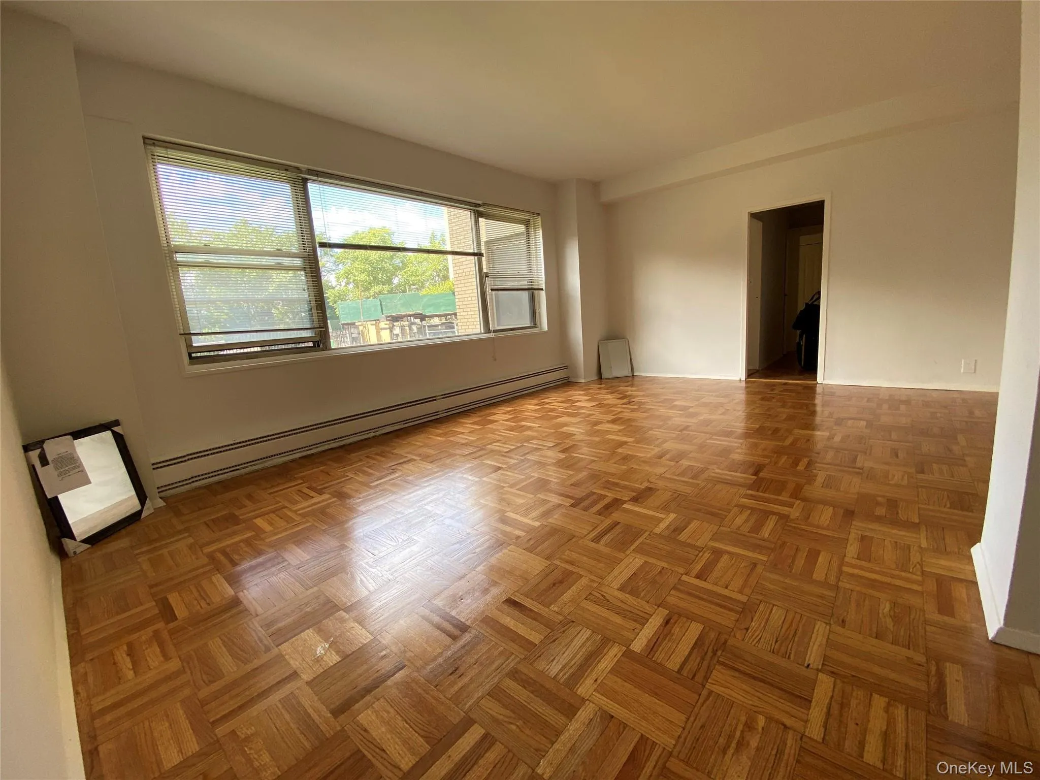 Spare room featuring baseboard heating Spare room featuring baseboard heating