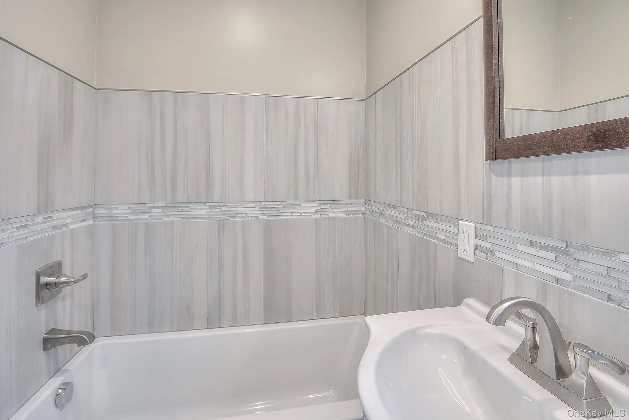 Full bathroom with a sink Full bathroom with a sink