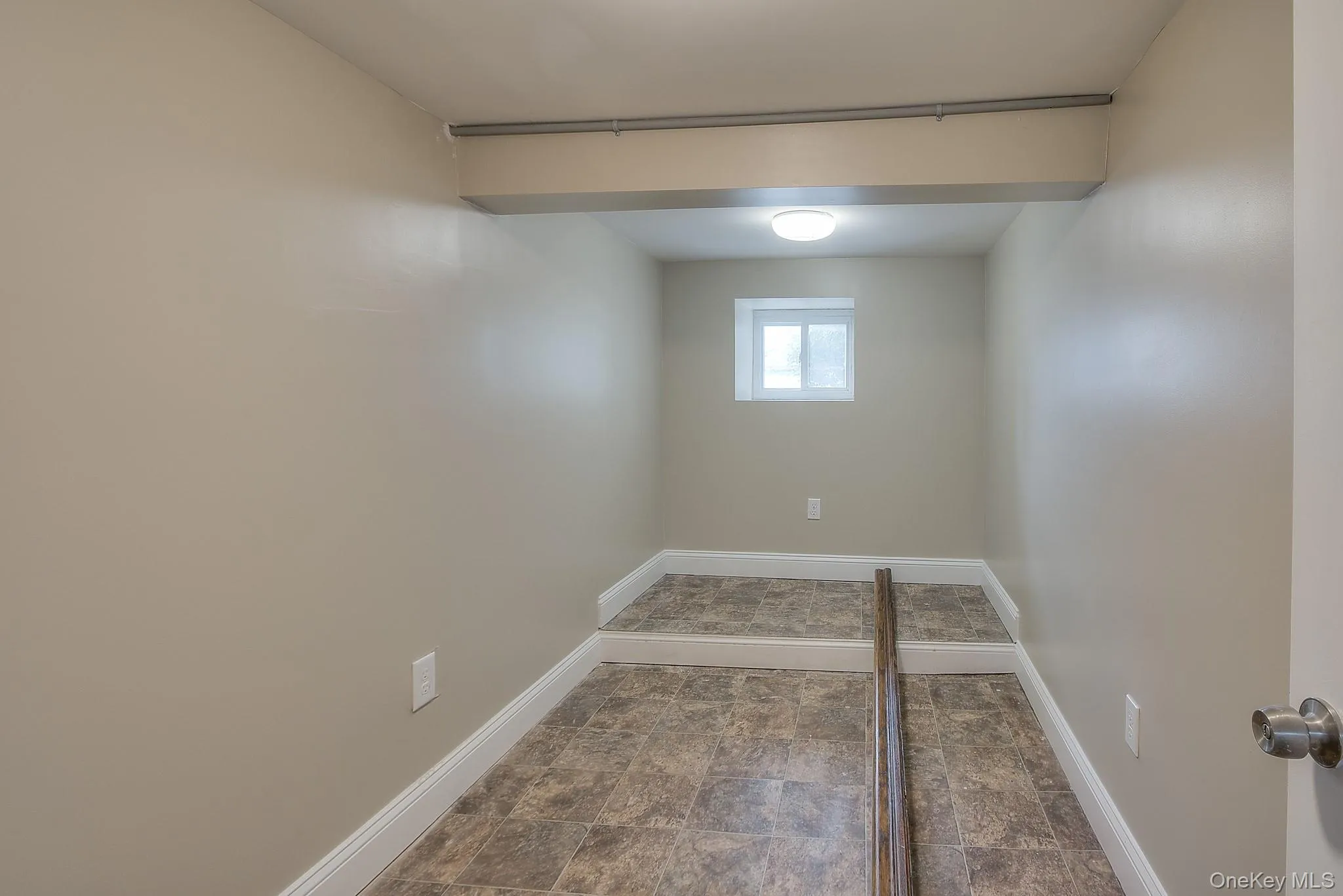 Spare room with baseboards Spare room with baseboards