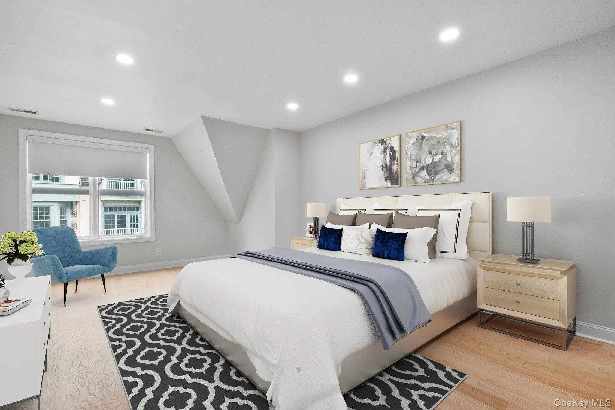 Virtually Staged Bedroom featuring light wood-style floors and recessed lighting Virtually Staged Bedroom featuring light wood-style floors and recessed lighting