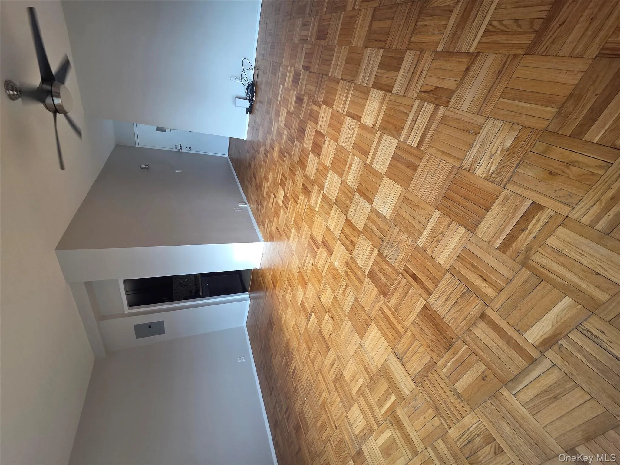 Empty room with ceiling fan and baseboards Empty room with ceiling fan and baseboards
