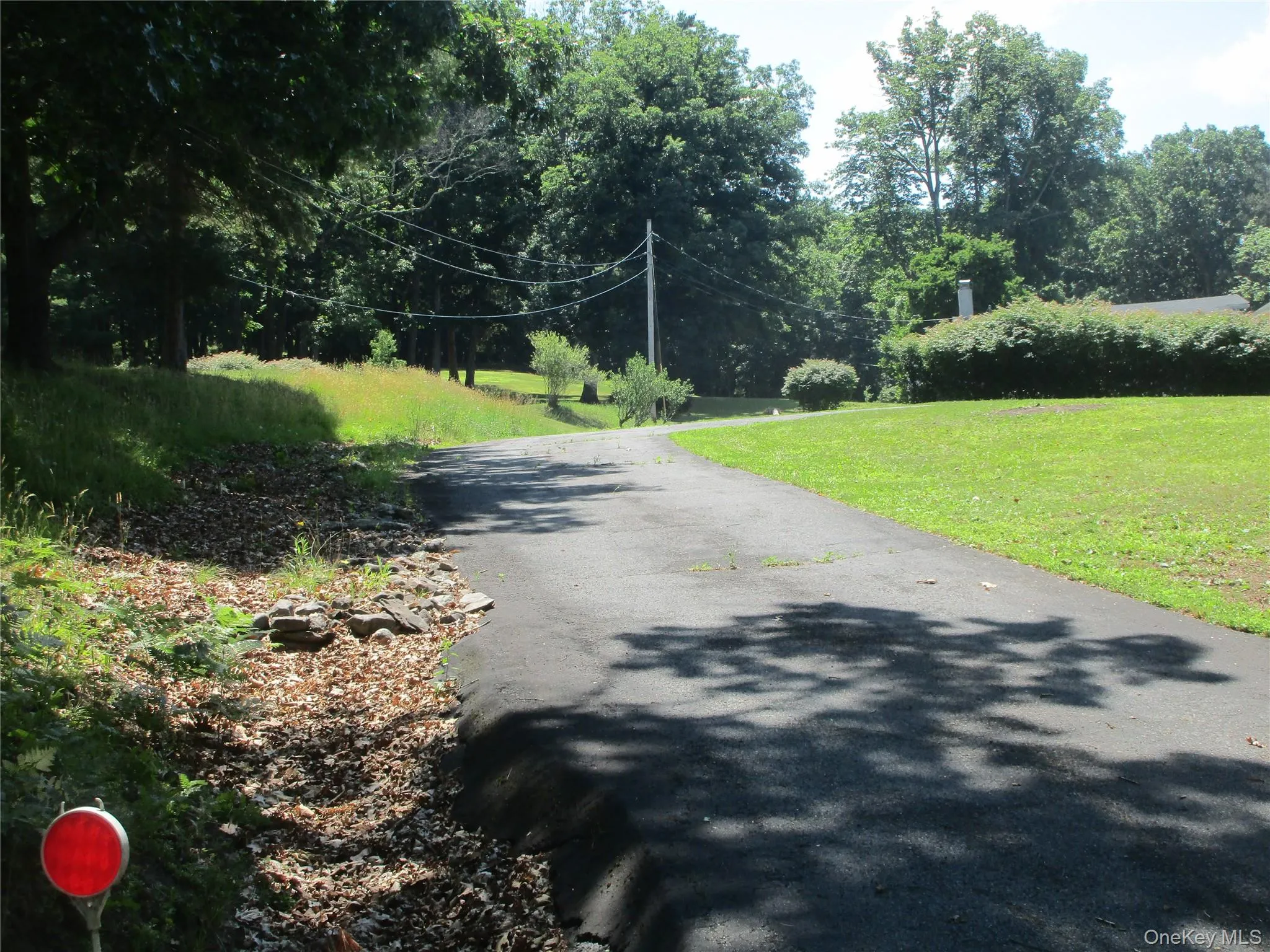 Driveway is private to home xtra parking space on right as you go in. Driveway is private to home xtra parking space on right as you go in.