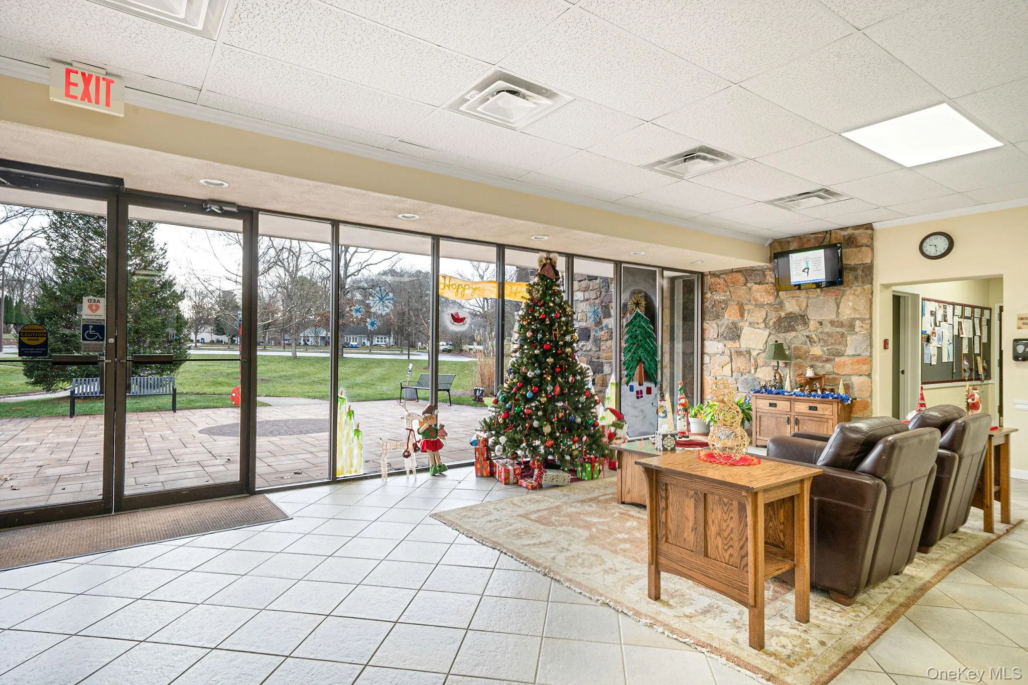 Common area with a paneled ceiling and ornamental molding Common area with a paneled ceiling and ornamental molding