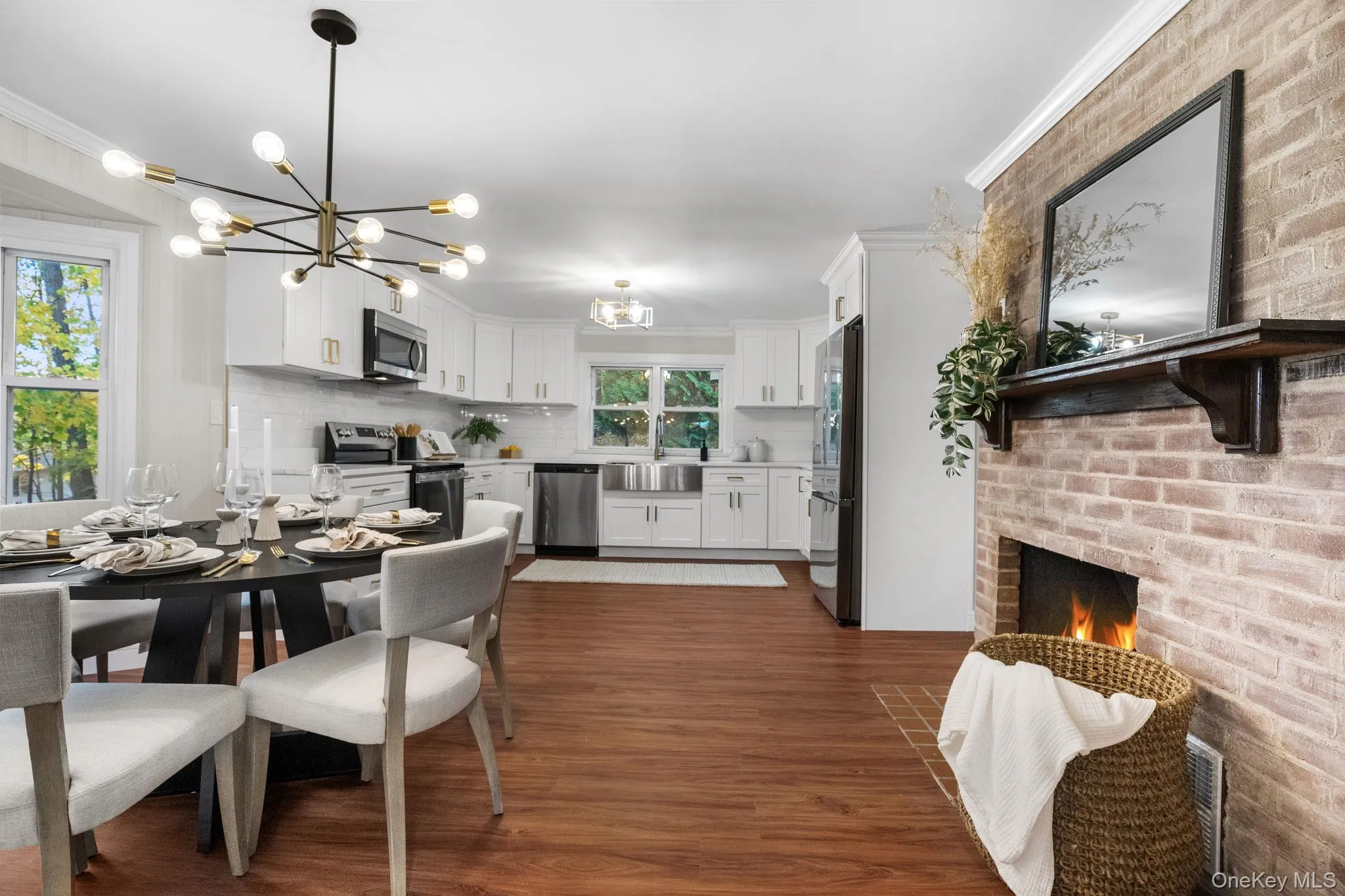 Open and inviting, this dining area connects seamlessly to the kitchen, making it ideal for both everyday living and entertaining. Open and inviting, this dining area connects seamlessly to the kitchen, making it ideal for both everyday living and entertaining.