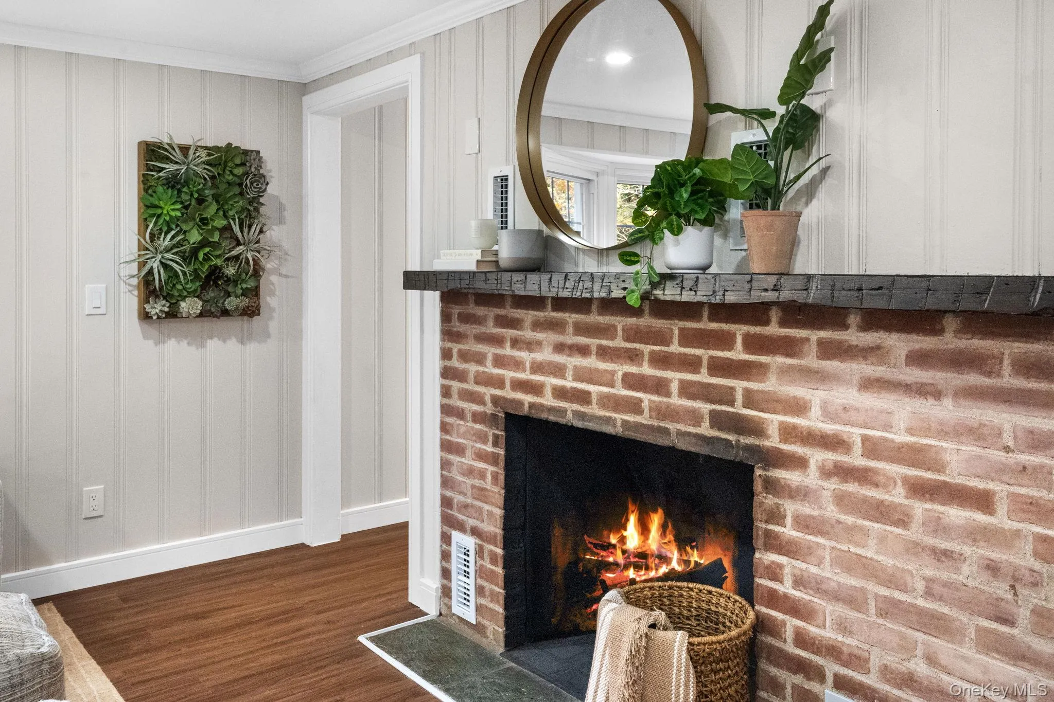 Modern charm meets rustic texture in this cozy focal point, perfect for curling up on cool evenings. Modern charm meets rustic texture in this cozy focal point, perfect for curling up on cool evenings.