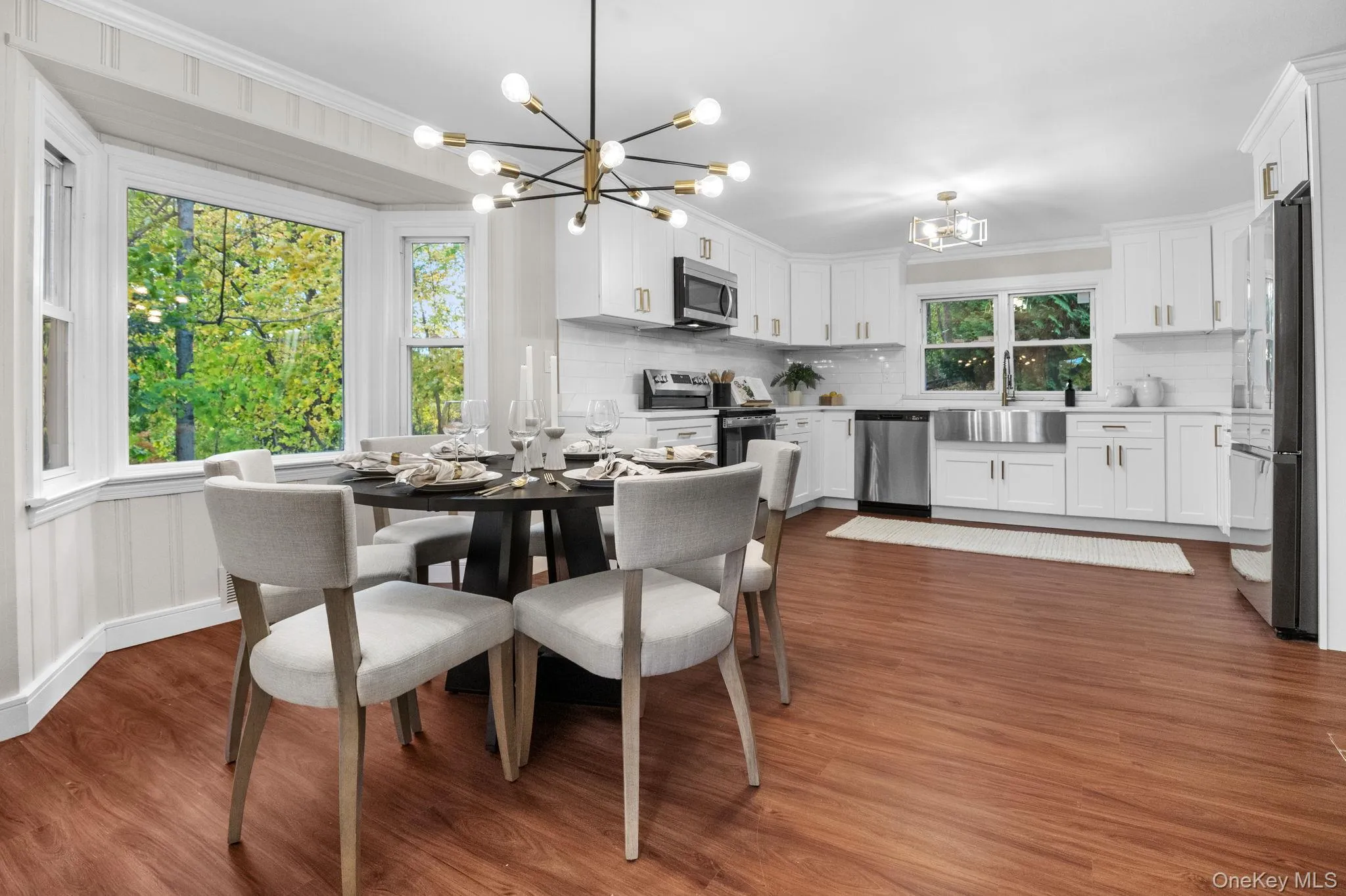 Open-concept design connects the kitchen and dining spaces seamlessly, ideal for gatherings and comfortable everyday living. Open-concept design connects the kitchen and dining spaces seamlessly, ideal for gatherings and comfortable everyday living.