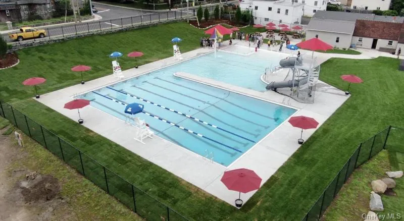 Community pool with a patio Community pool with a patio