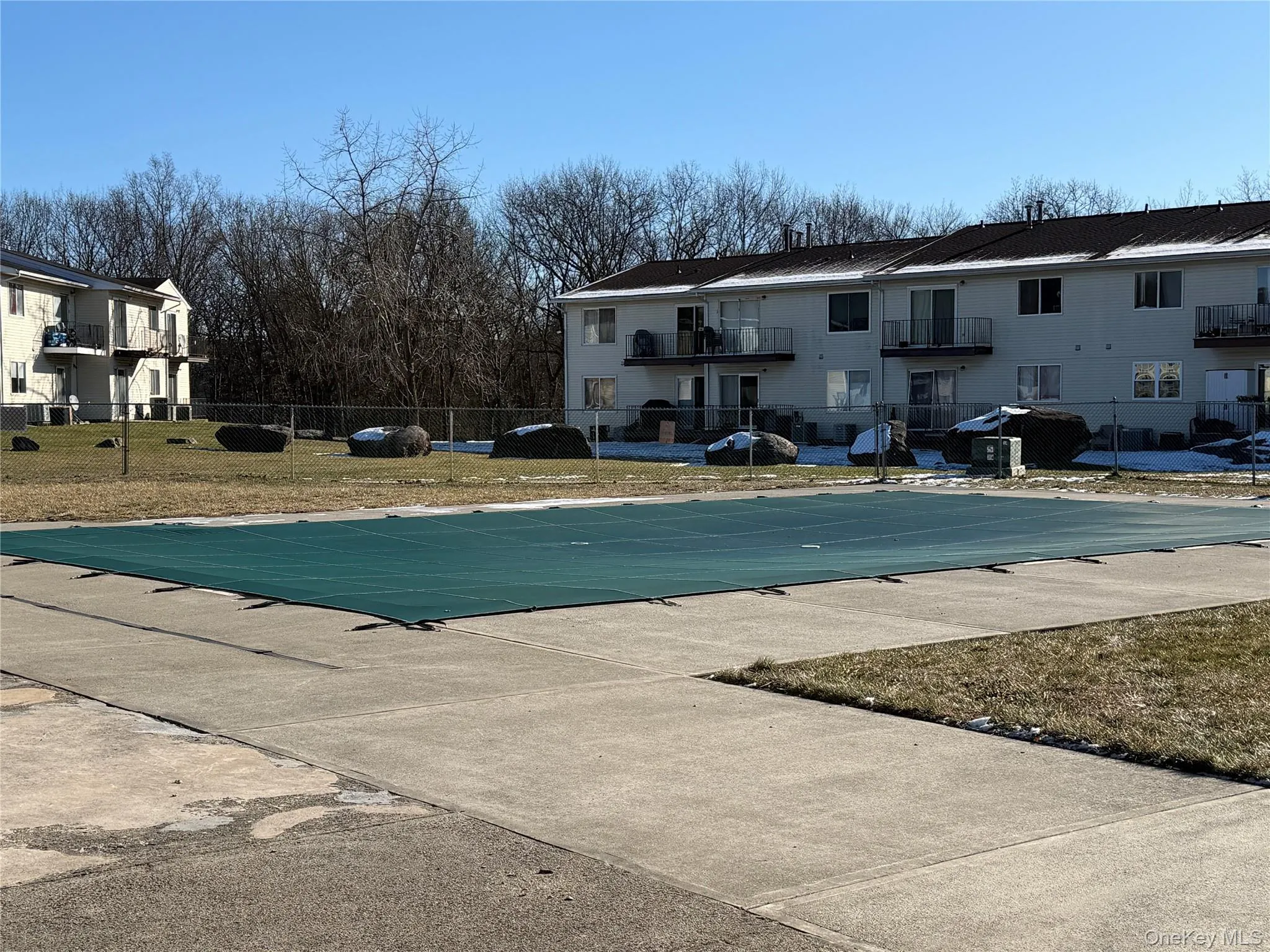 View of pool with a balcony and a residential view View of pool with a balcony and a residential view