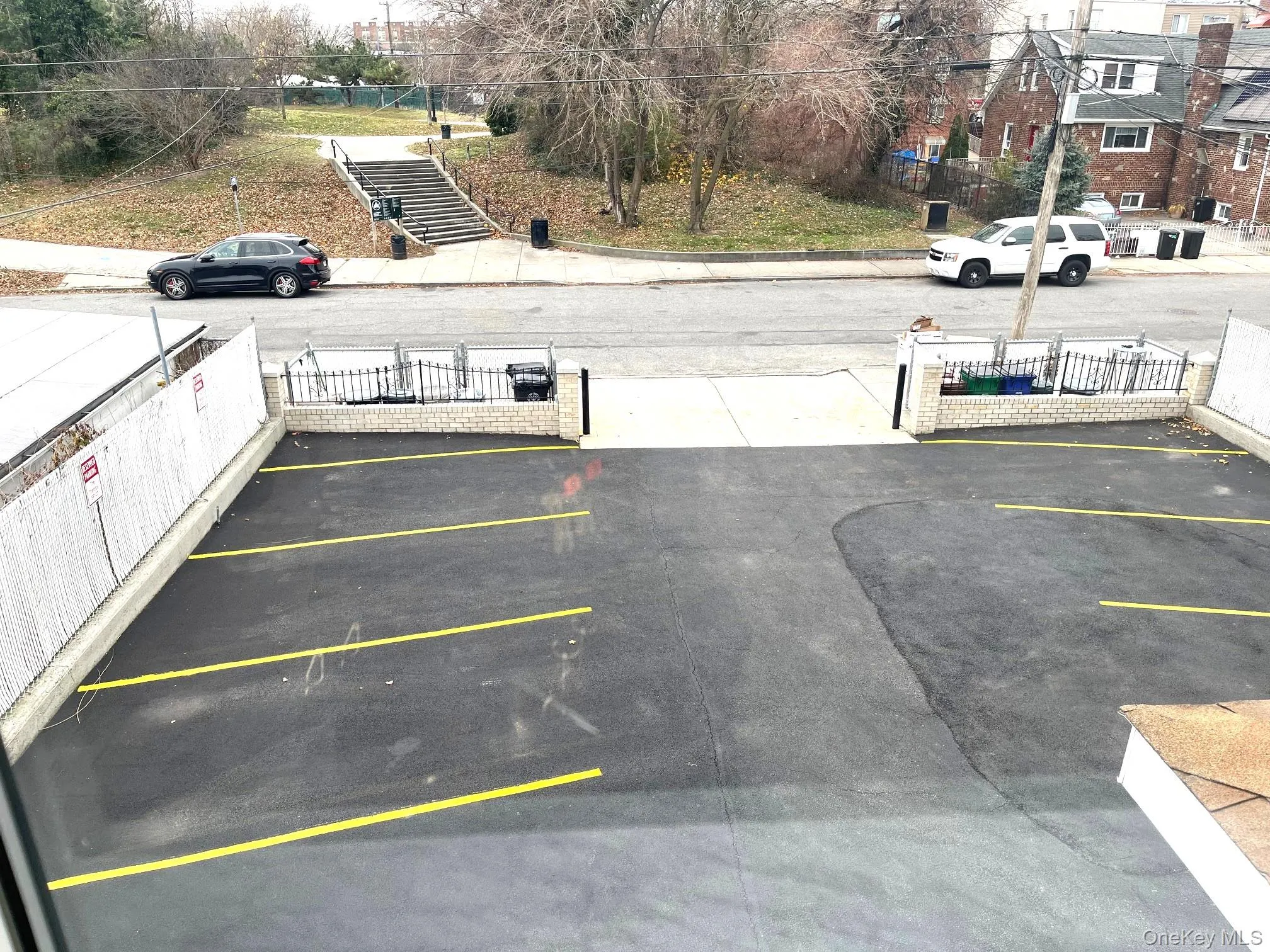 View of uncovered parking lot View of uncovered parking lot