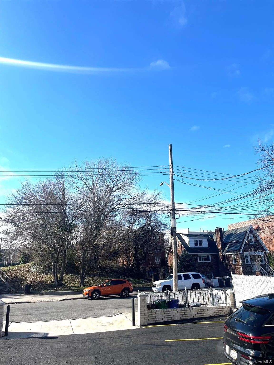 View of asphalt street with street lighting View of asphalt street with street lighting