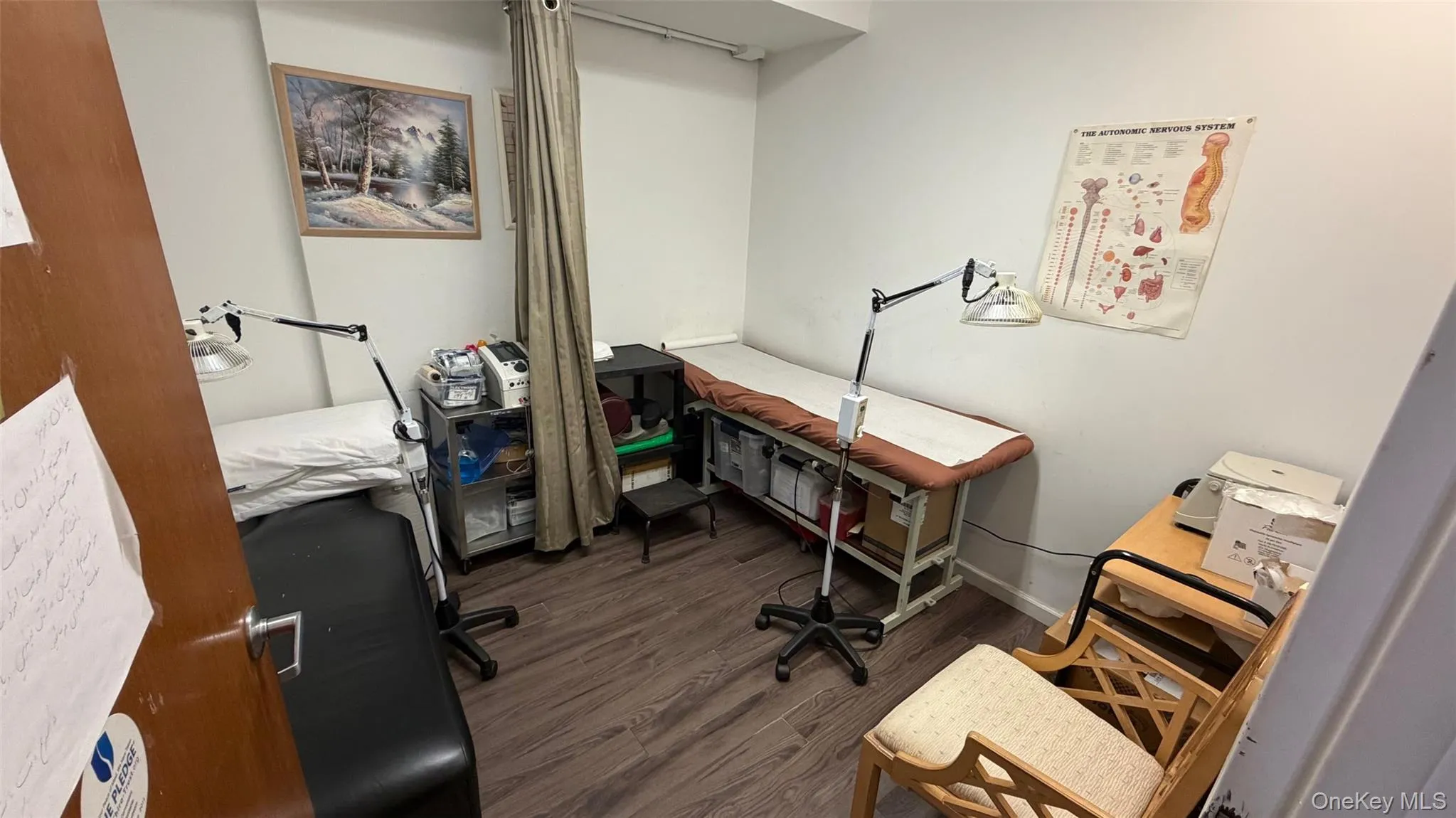 Office featuring dark wood-style floors Office featuring dark wood-style floors