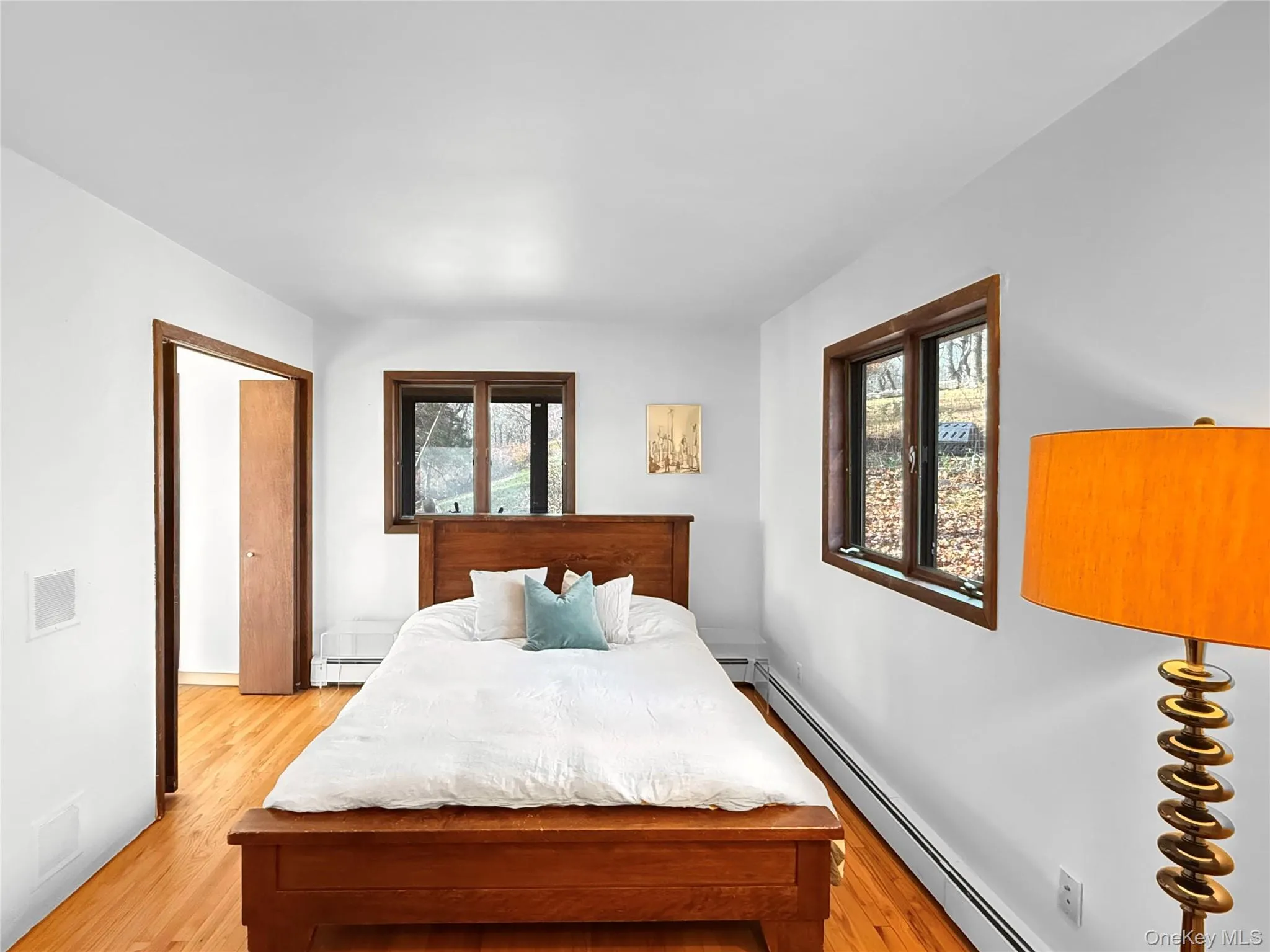 Primary bedroom on main floor with walk through closet and full ensuite bath Primary bedroom on main floor with walk through closet and full ensuite bath