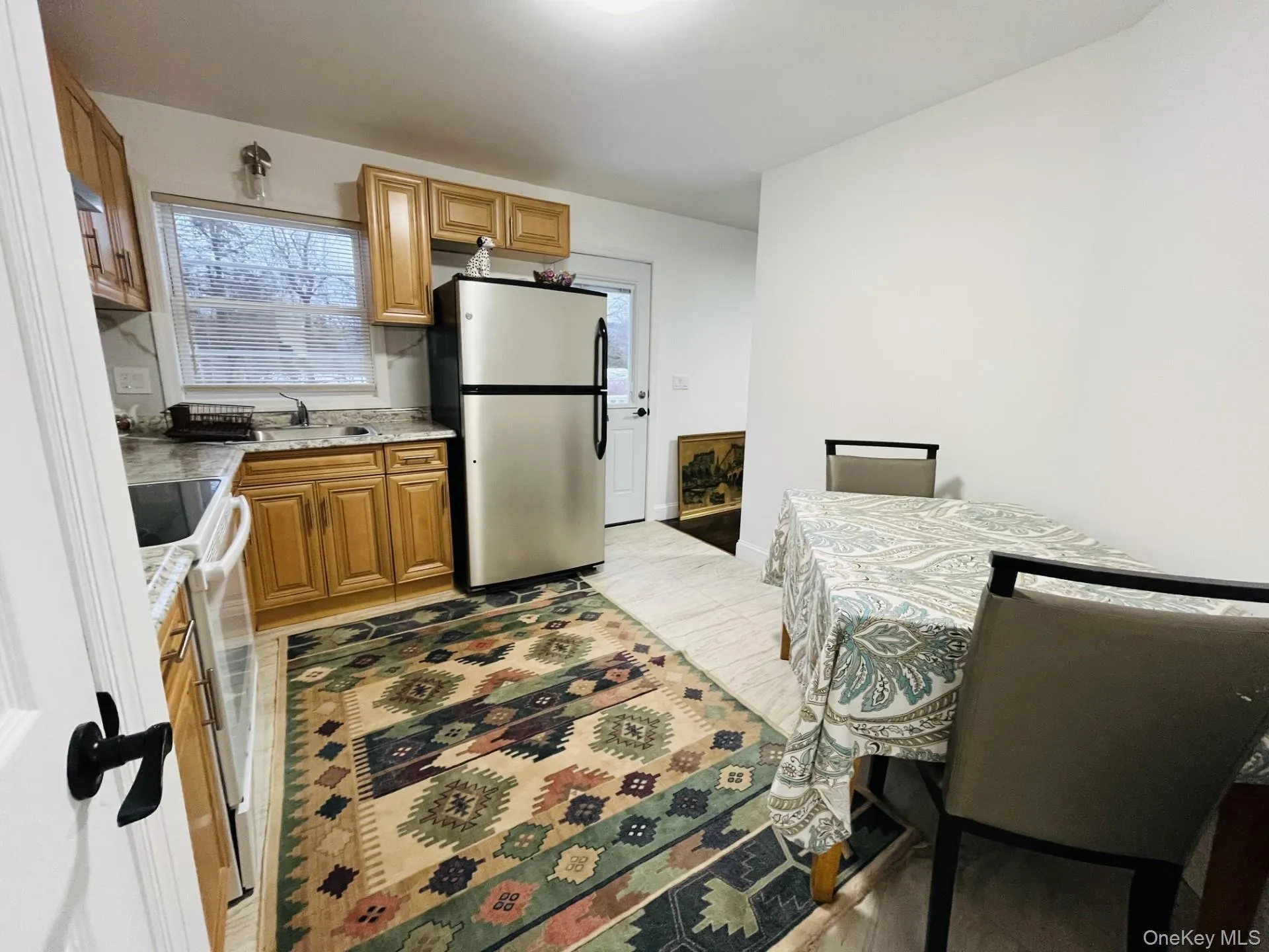 Kitchen with door out to deck Kitchen with door out to deck