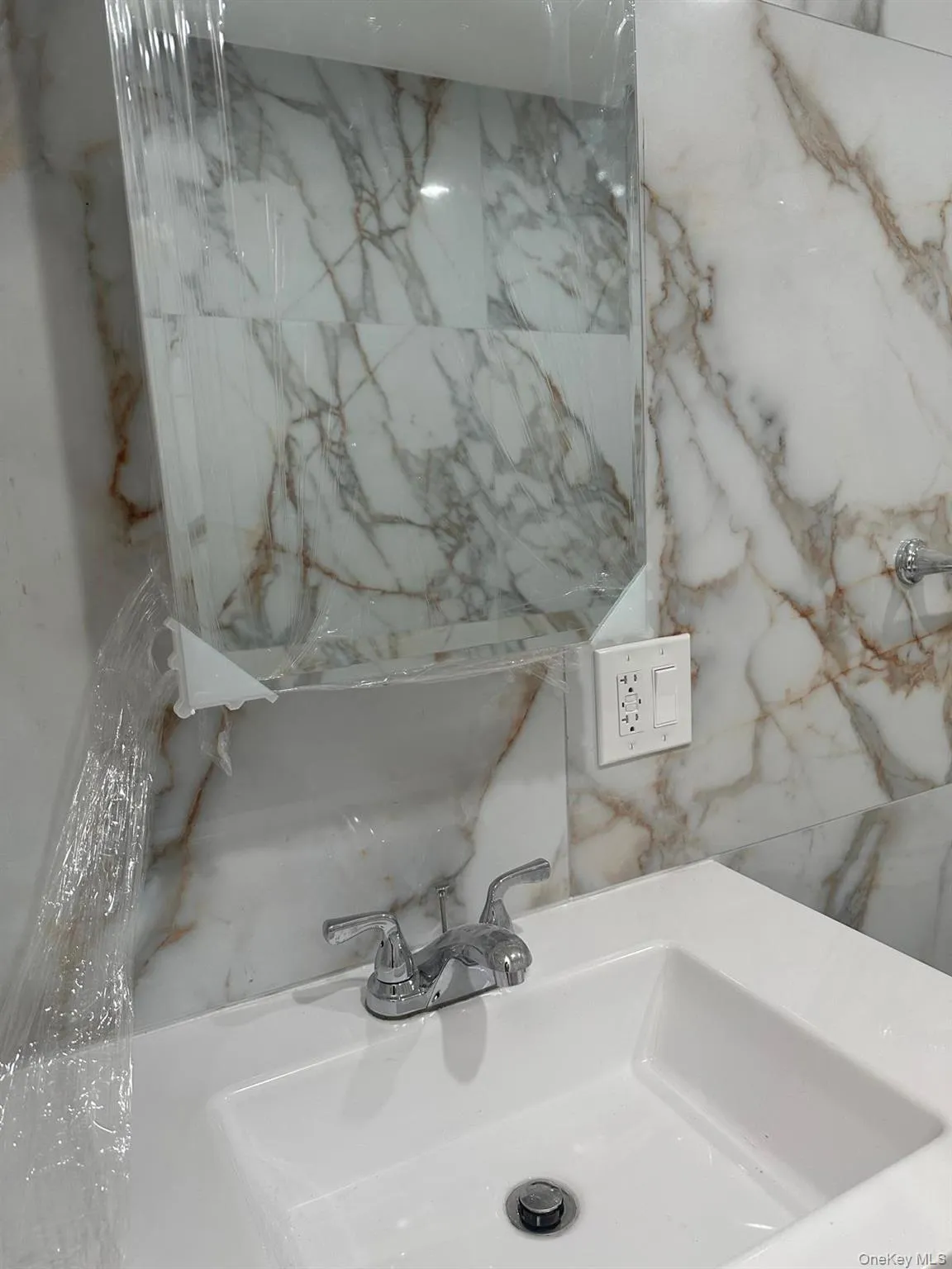 Bathroom view of a sink Bathroom view of a sink