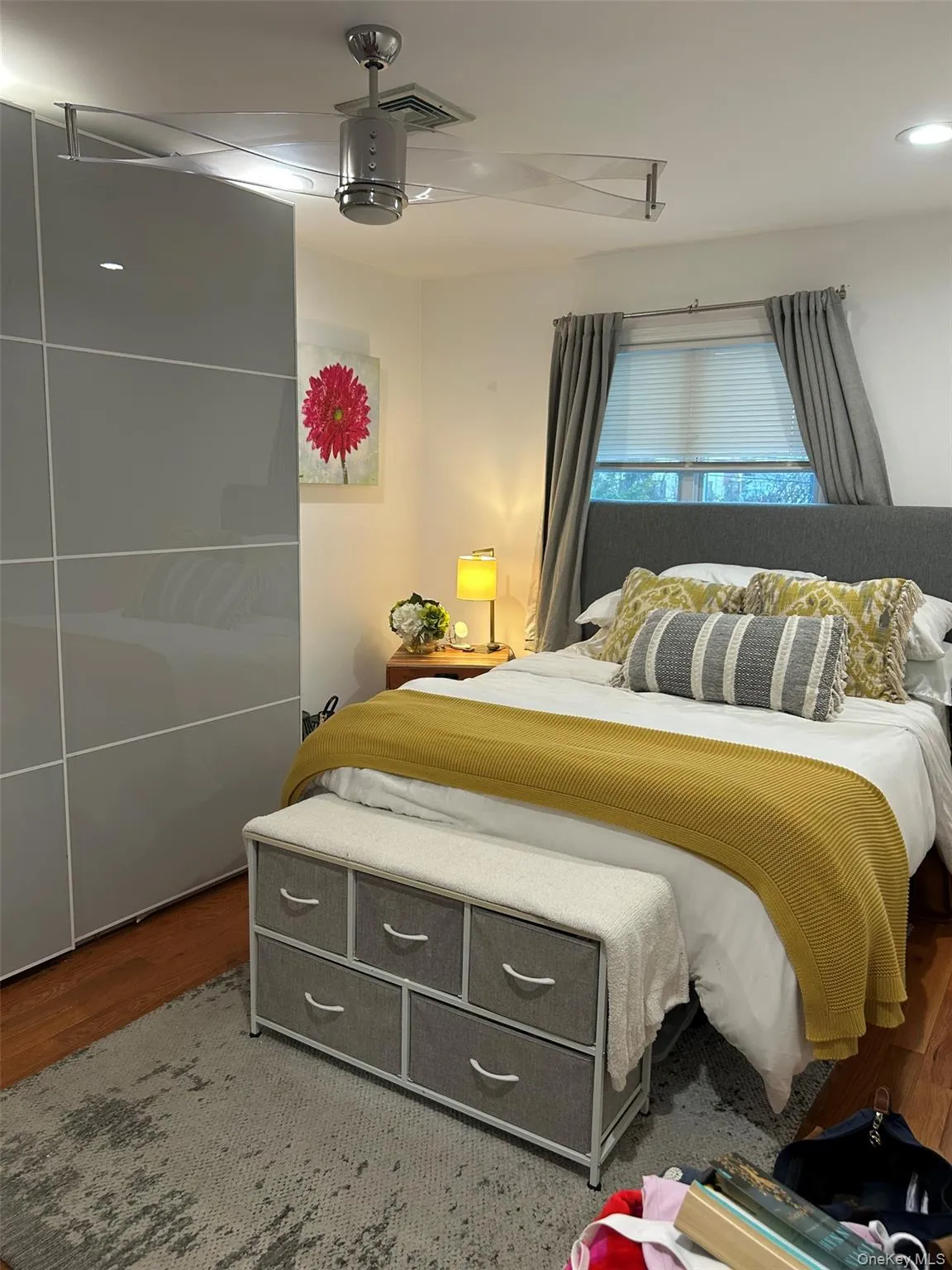 Bedroom featuring wood finished floors Bedroom featuring wood finished floors