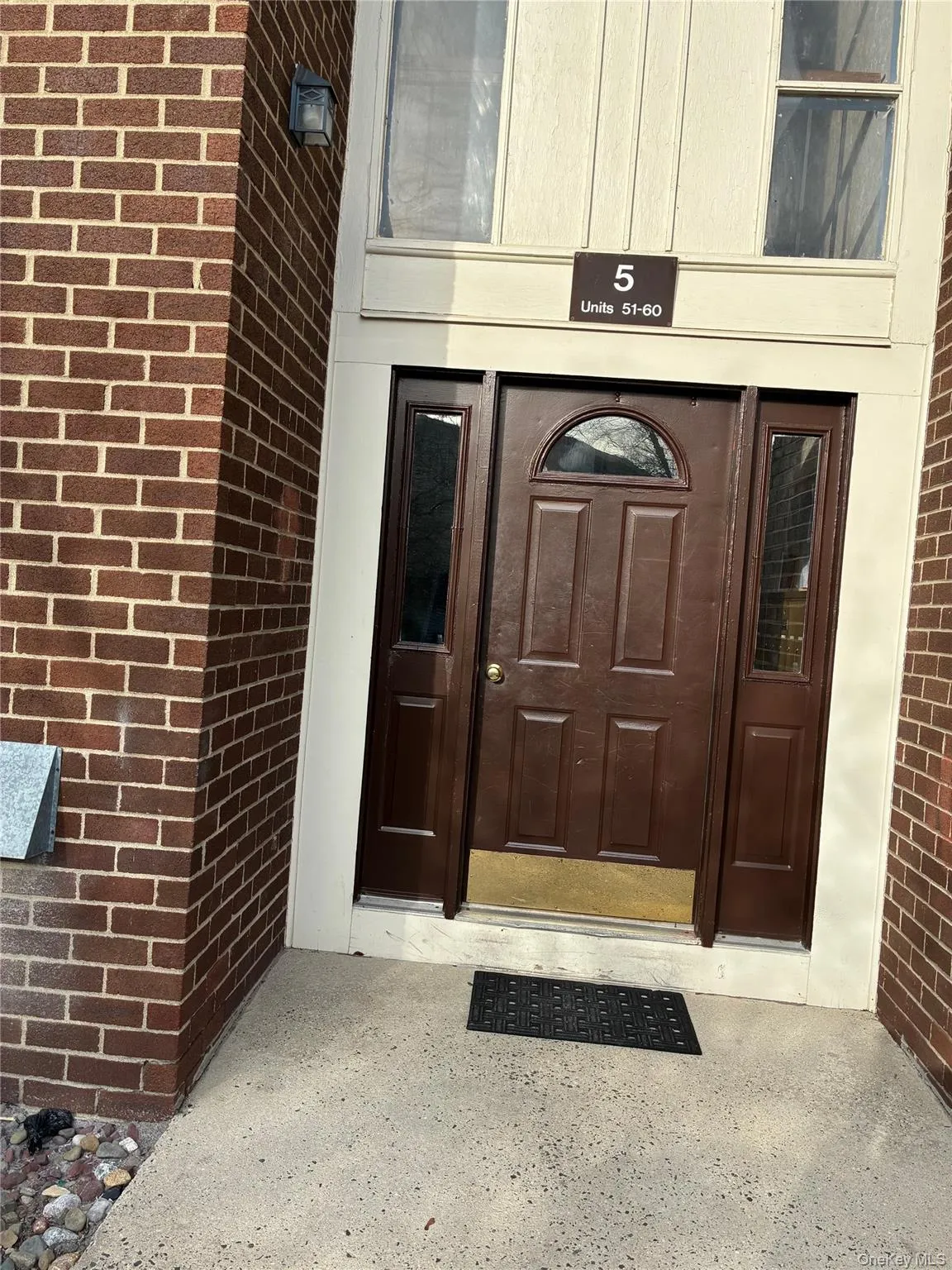 View of exterior entry featuring brick siding View of exterior entry featuring brick siding