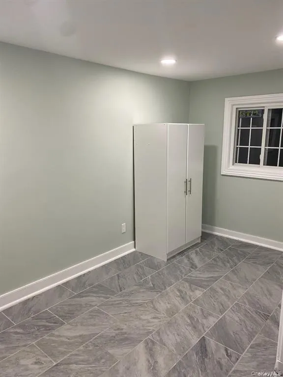 Unfurnished bedroom with baseboards Unfurnished bedroom with baseboards