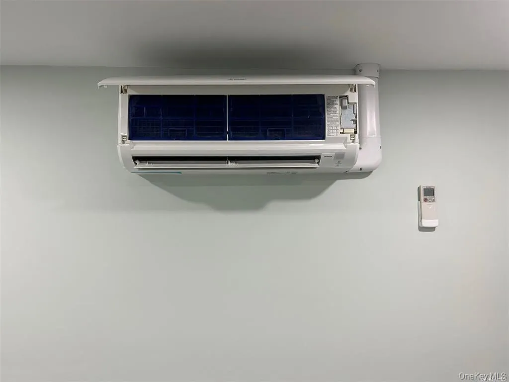 Detailed view of an AC wall unit Detailed view of an AC wall unit