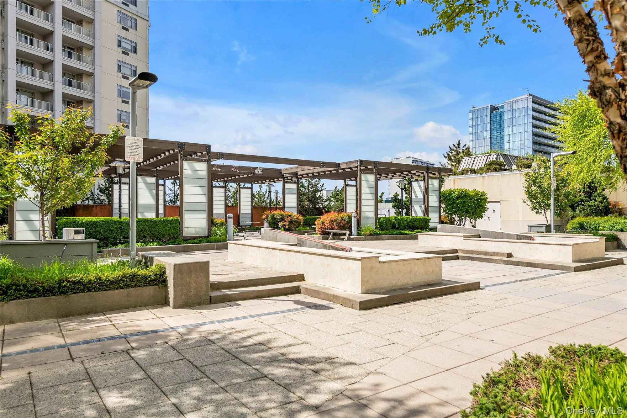 View of home's community featuring a patio and a pergola View of home's community featuring a patio and a pergola
