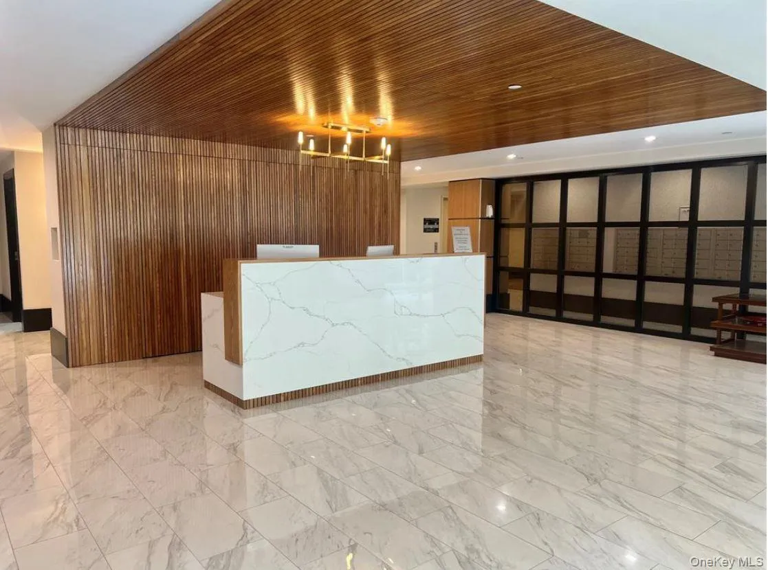 Modern lobby with 24-hour concierge Modern lobby with 24-hour concierge