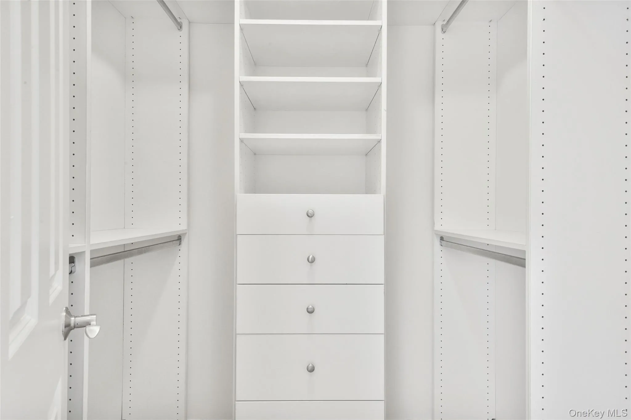 View of walk in closet View of walk in closet