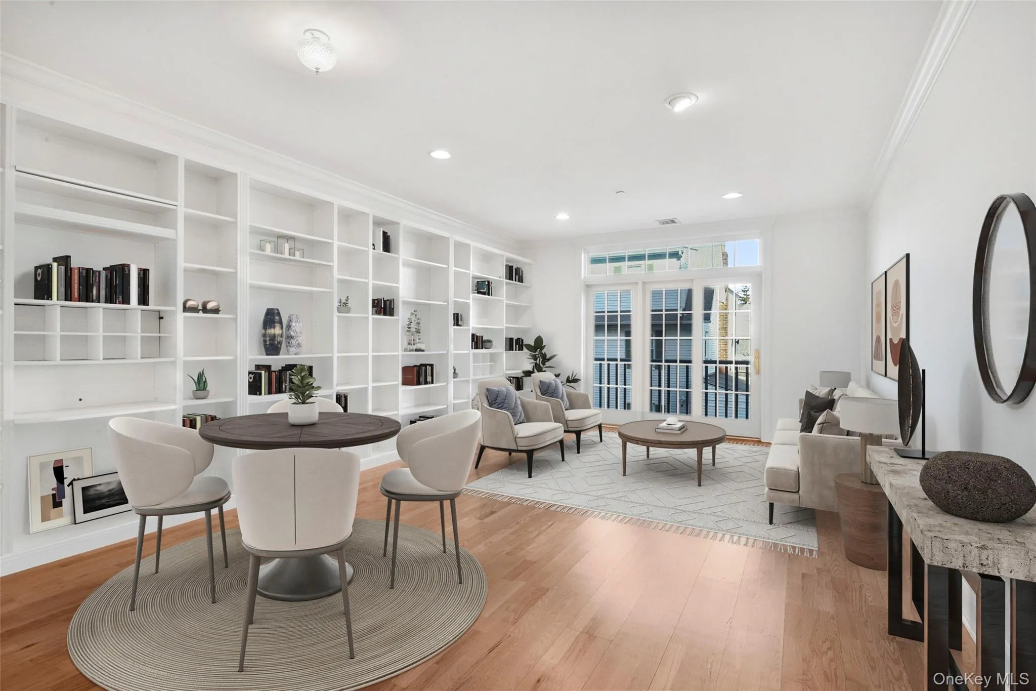 Dining room featuring crown molding, light wood-style flooring, and recessed lighting Dining room featuring crown molding, light wood-style flooring, and recessed lighting