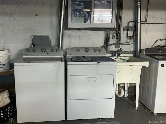 Washroom featuring washer and dryer Washroom featuring washer and dryer